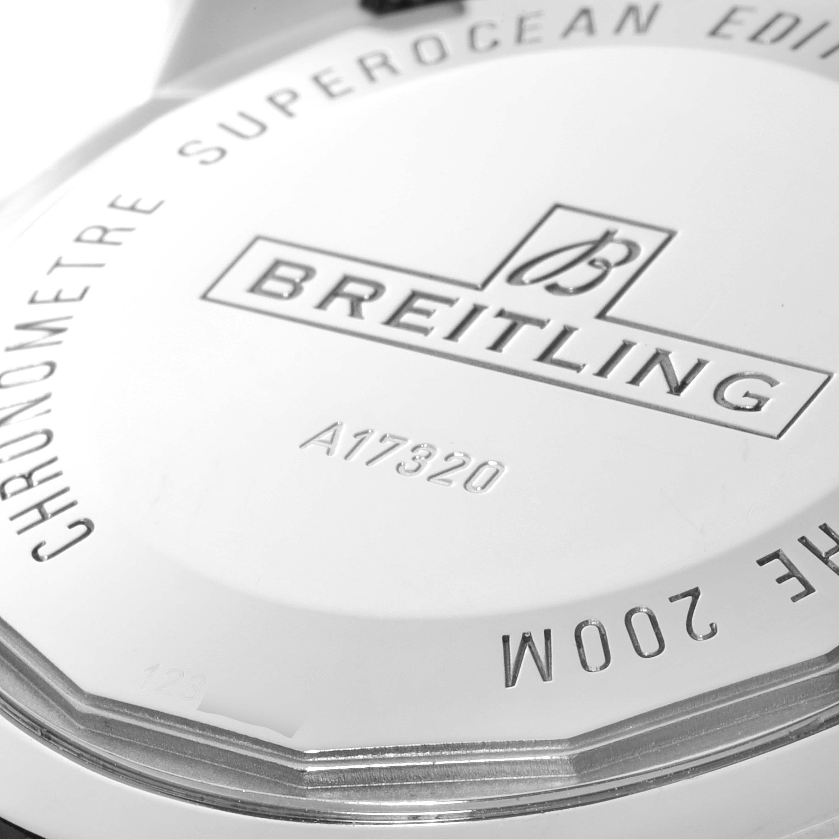 The image shows a close-up of the case back of a Breitling Superocean A17320 Men's Stainless Steel Black Dial A17320 Men's Stainless Steel Black Dial watch, highlighting its engravings and brand logo.
