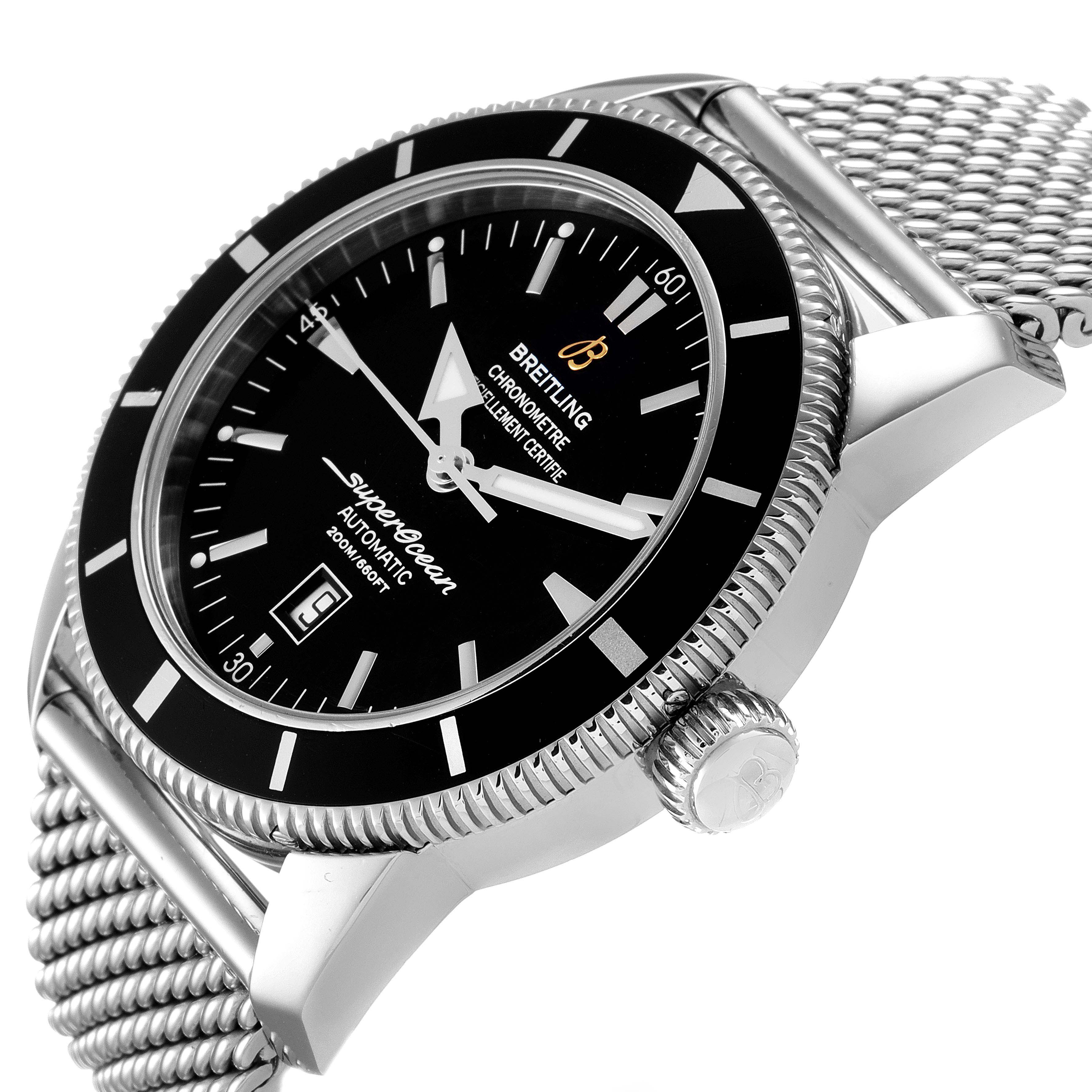 This image shows a close-up, angled view of the Breitling Superocean A17320 Men's Stainless Steel Black Dial A17320 Men's Stainless Steel Black Dial watch face, bezel, crown, and part of its mesh bracelet.