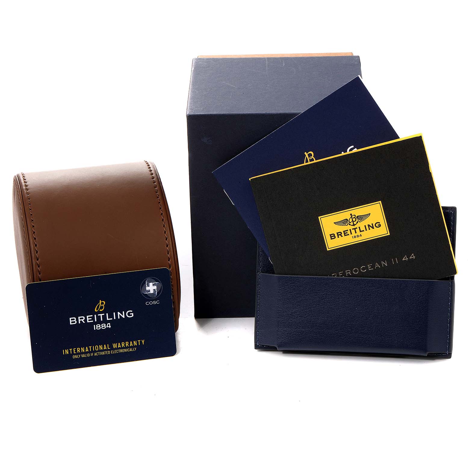 This image shows the packaging, warranty card, and documentation for a Breitling Superocean A17367021I1A1 Men's Stainless Steel Yellow Dial A17367021I1A1 Men's Stainless Steel Yellow Dial watch.