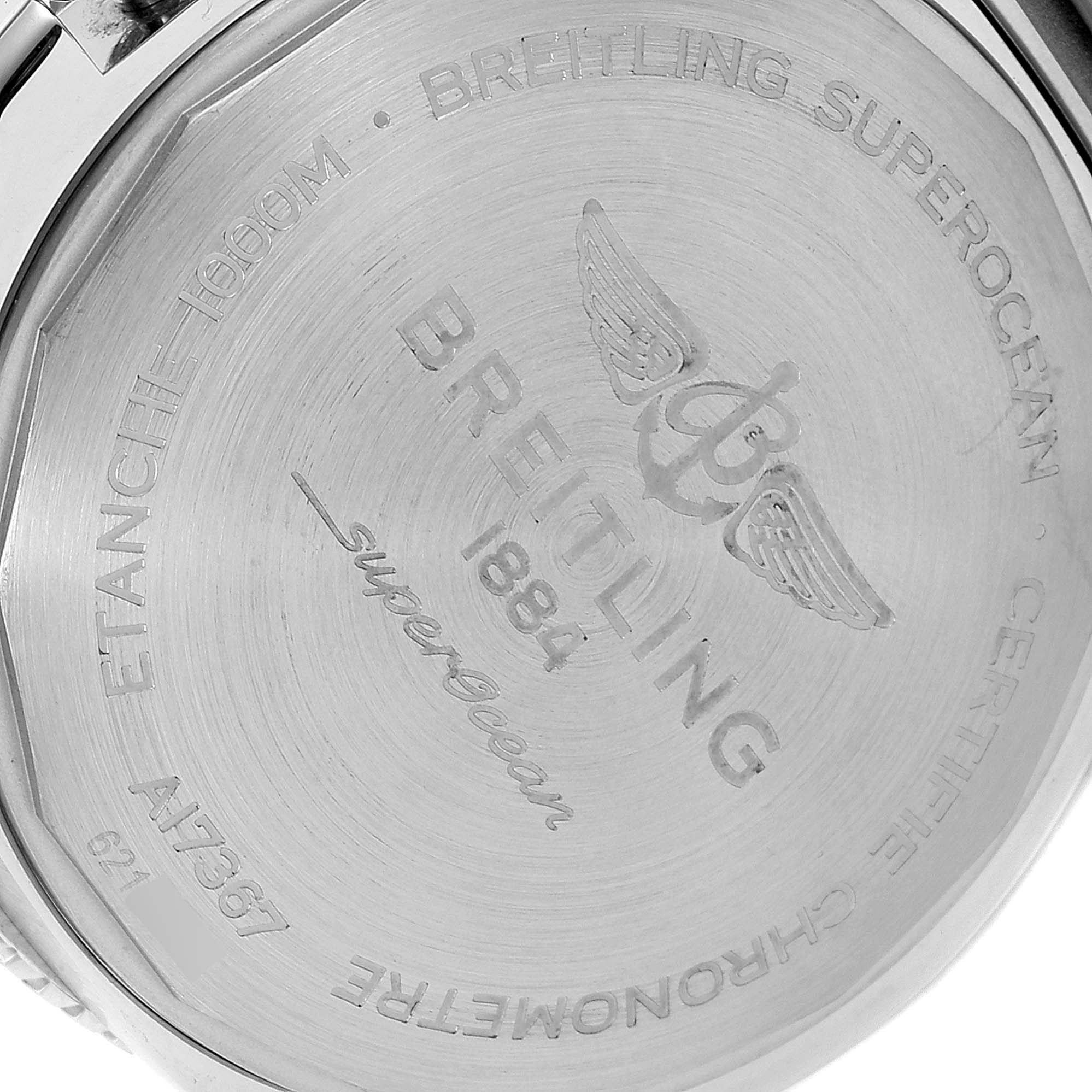 The image shows the back case of a Breitling Superocean A17367021I1A1 Men's Stainless Steel Yellow Dial A17367021I1A1 Men's Stainless Steel Yellow Dial watch, displaying the brand’s logo, model name, and other engravings.