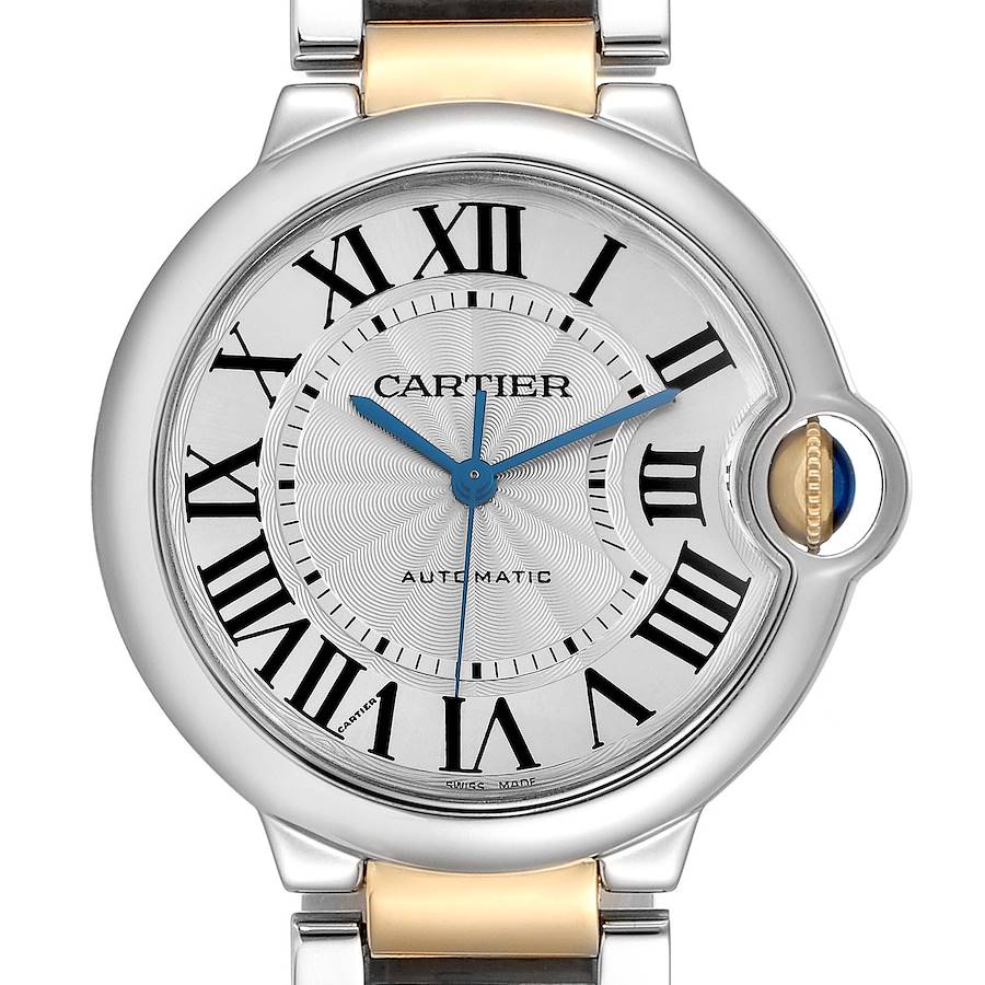 The Cartier Ballon Bleu watch is shown from the front, highlighting the Roman numerals, blue hands, and crown with a blue cabochon.