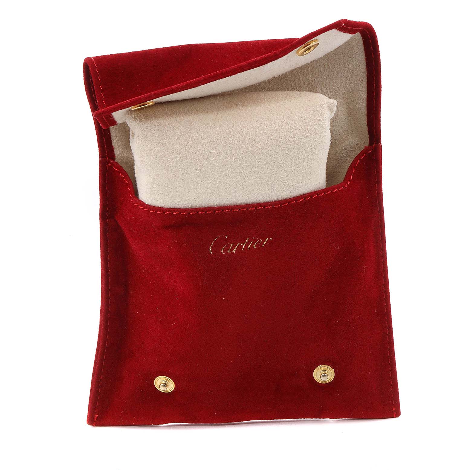 The image shows a red velvet pouch with "Cartier" branding, containing a cushion, viewed from the front.