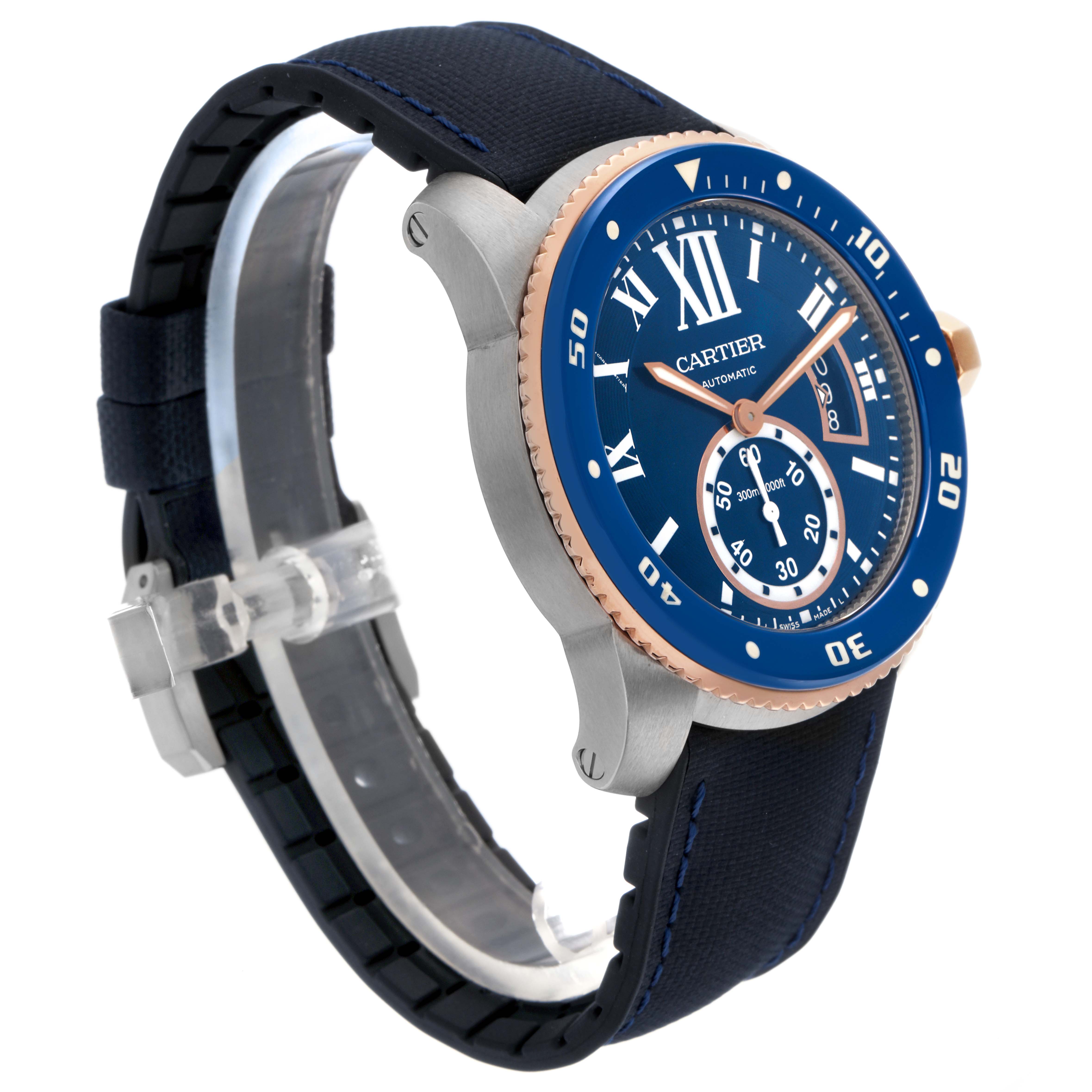 The Calibre de Cartier watch is shown at a three-quarter angle, highlighting the blue bezel, rose gold accents, dial, and strap.