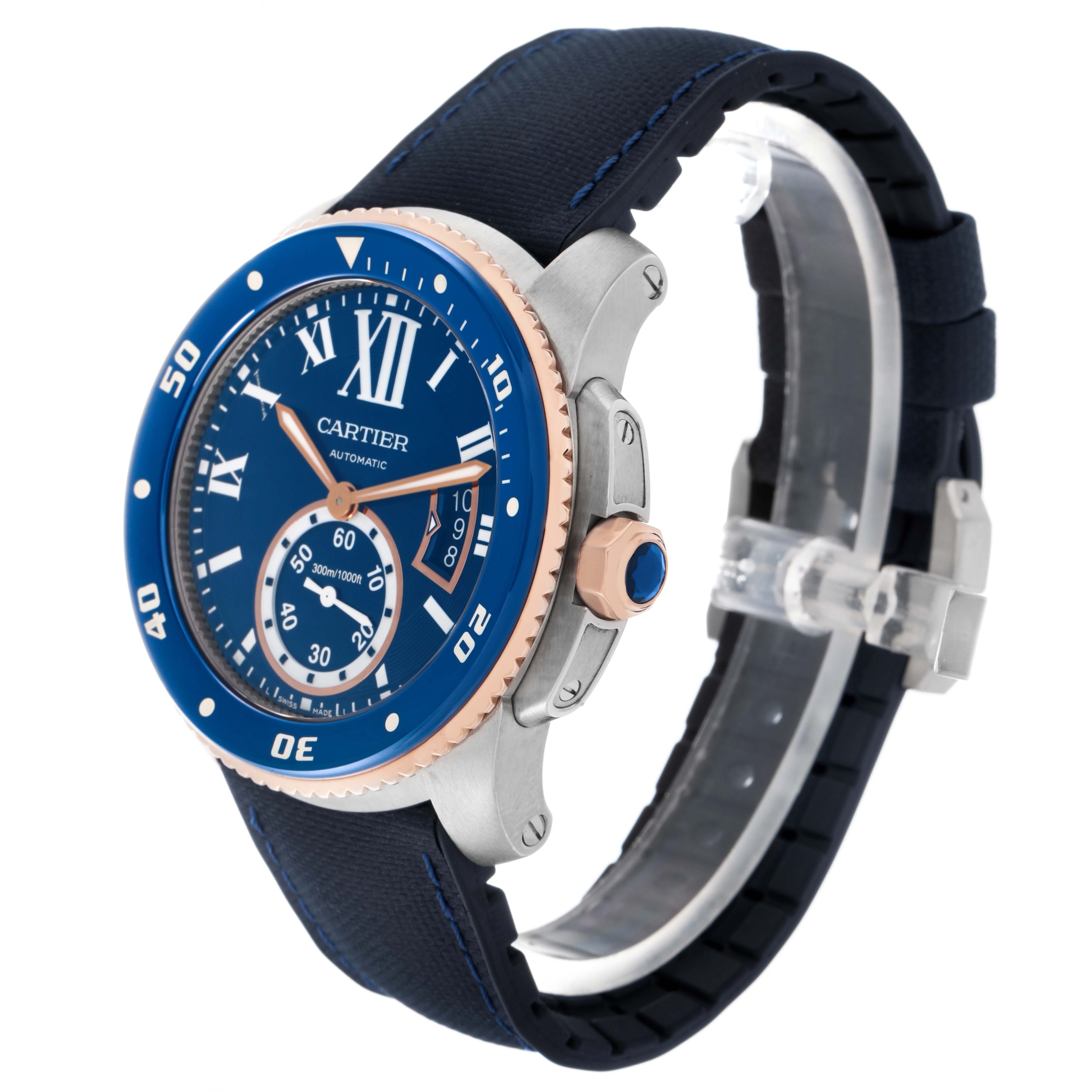 The Calibre de Cartier watch is shown at an angled side view, highlighting the bezel, face, and strap.