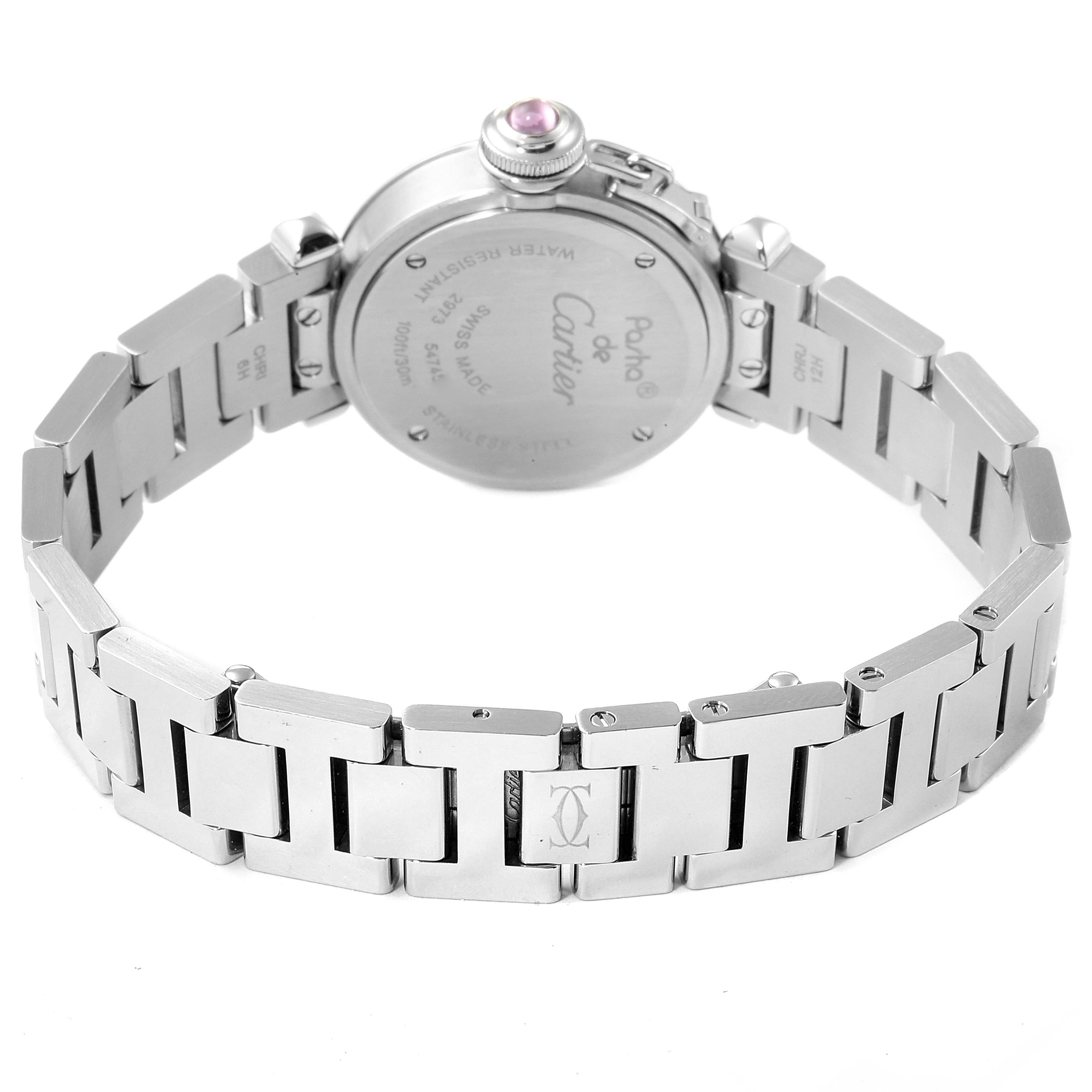 The image shows the back and bracelet of a Cartier Pasha W3140008 Women's Stainless Steel Pink Dial W3140008 Women's Stainless Steel Pink Dial model watch, highlighting the clasp and engraved case back.