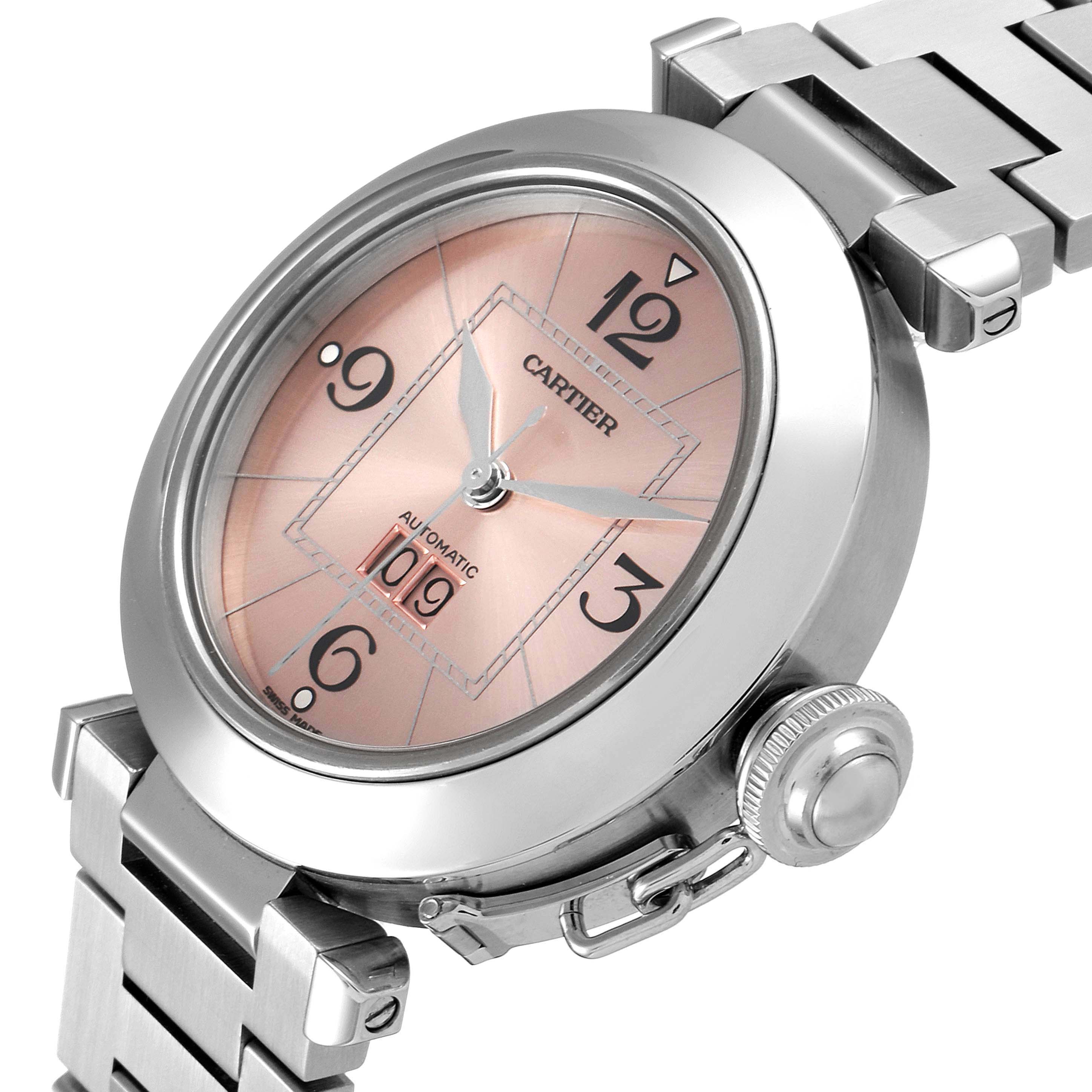 This image shows a close-up angle of the Cartier Pasha W31058M7 Men's Stainless Steel Pink Dial W31058M7 Men's Stainless Steel Pink Dial watch, spotlighting its face, crown, and part of the metal bracelet.
