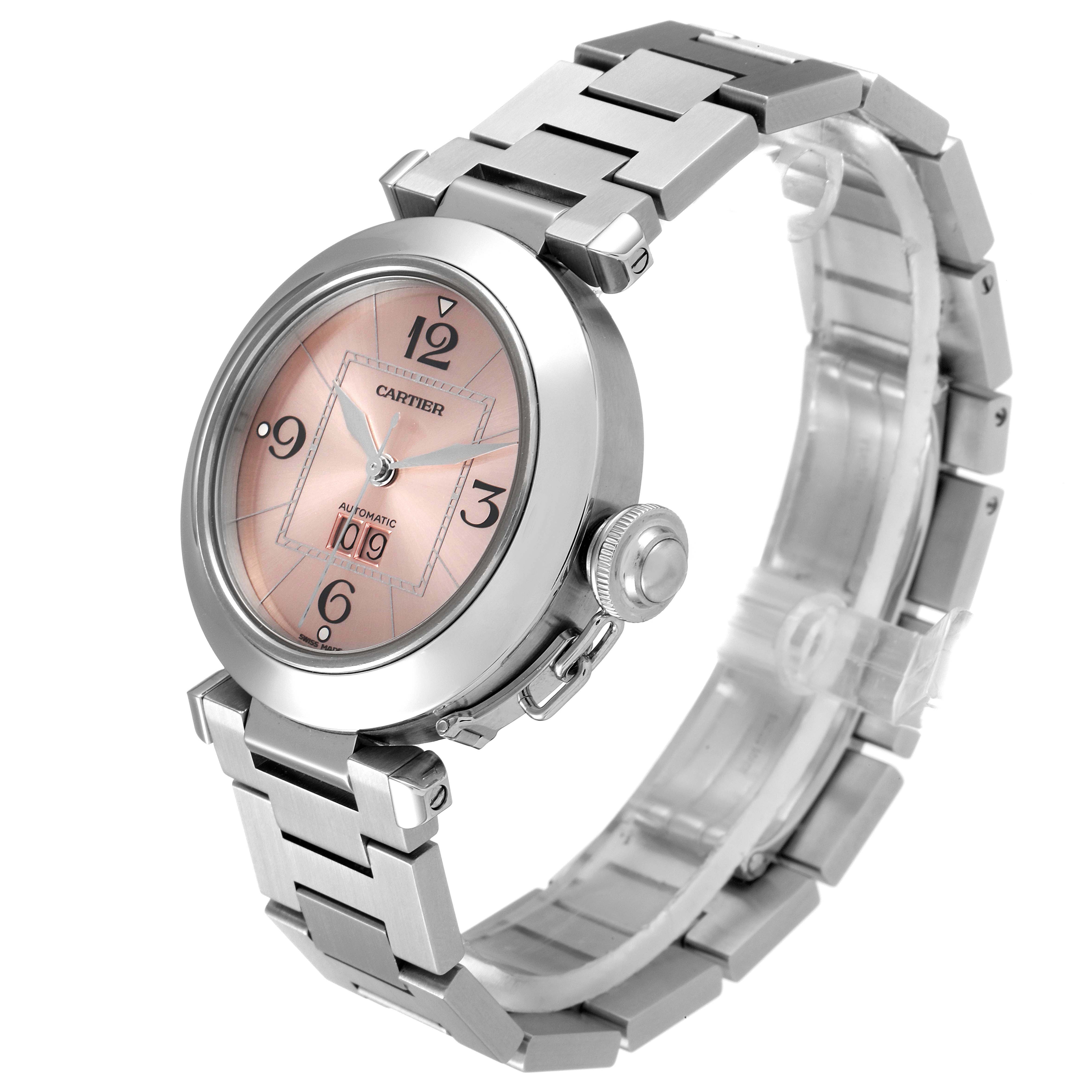 The Cartier Pasha W31058M7 Men's Stainless Steel Pink Dial W31058M7 Men's Stainless Steel Pink Dial watch is shown at a three-quarter angle, highlighting the face, crown, and bracelet.