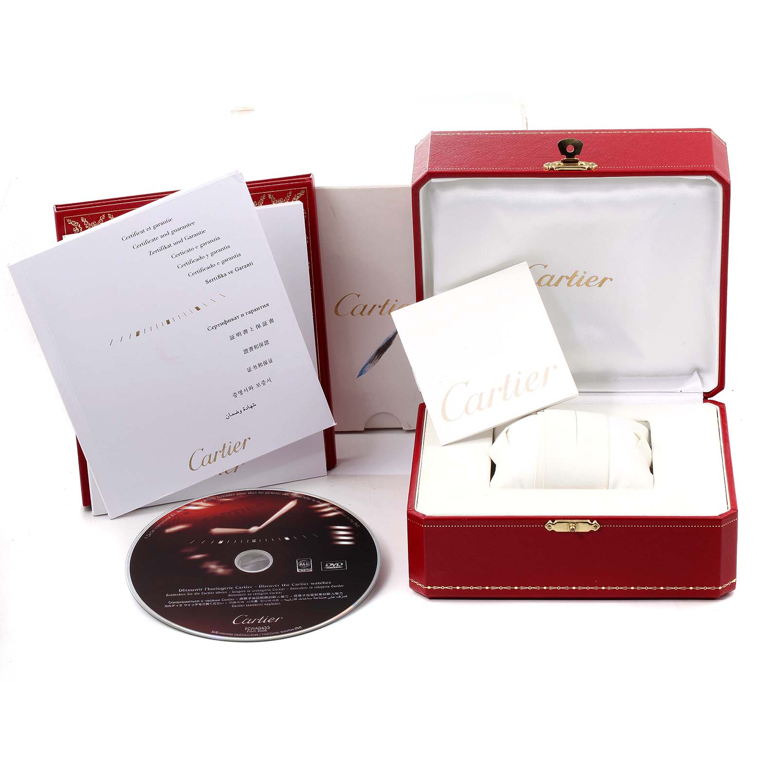 The image shows packaging, booklets, and a disc for the Cartier Pasha W31074M7 Men's Stainless Steel White Dial W31074M7 Men's Stainless Steel White Dial model; the watch itself is not visible.