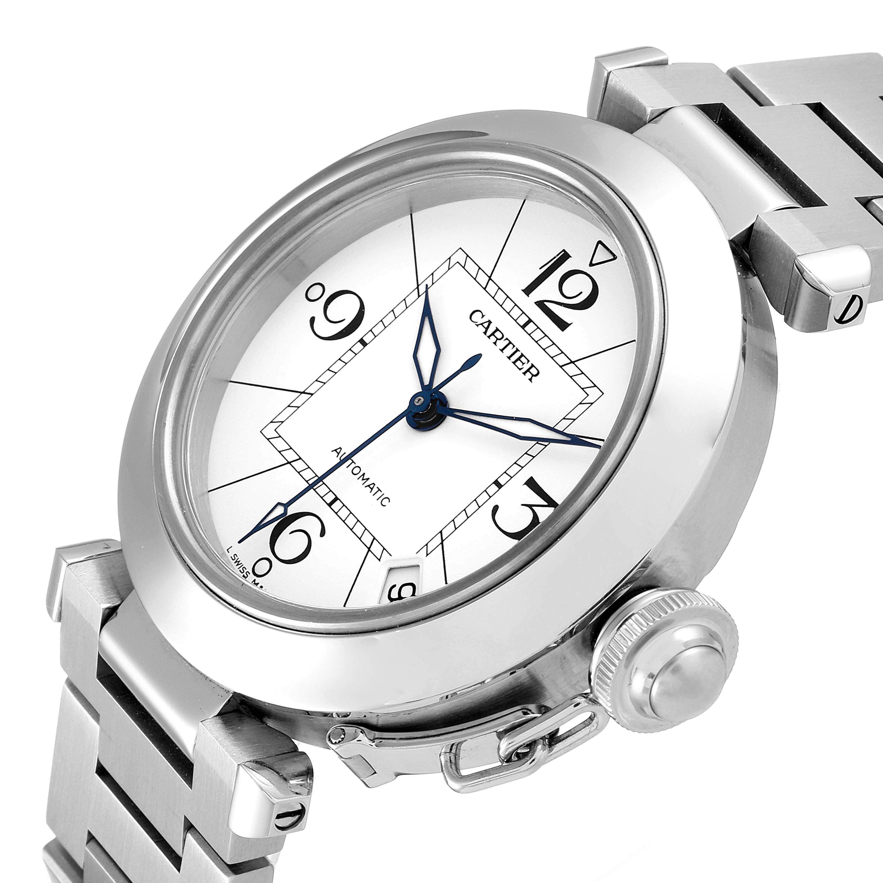 This close-up view of the Cartier Pasha W31074M7 Men's Stainless Steel White Dial W31074M7 Men's Stainless Steel White Dial watch shows the dial, bezel, crown, and part of the bracelet.