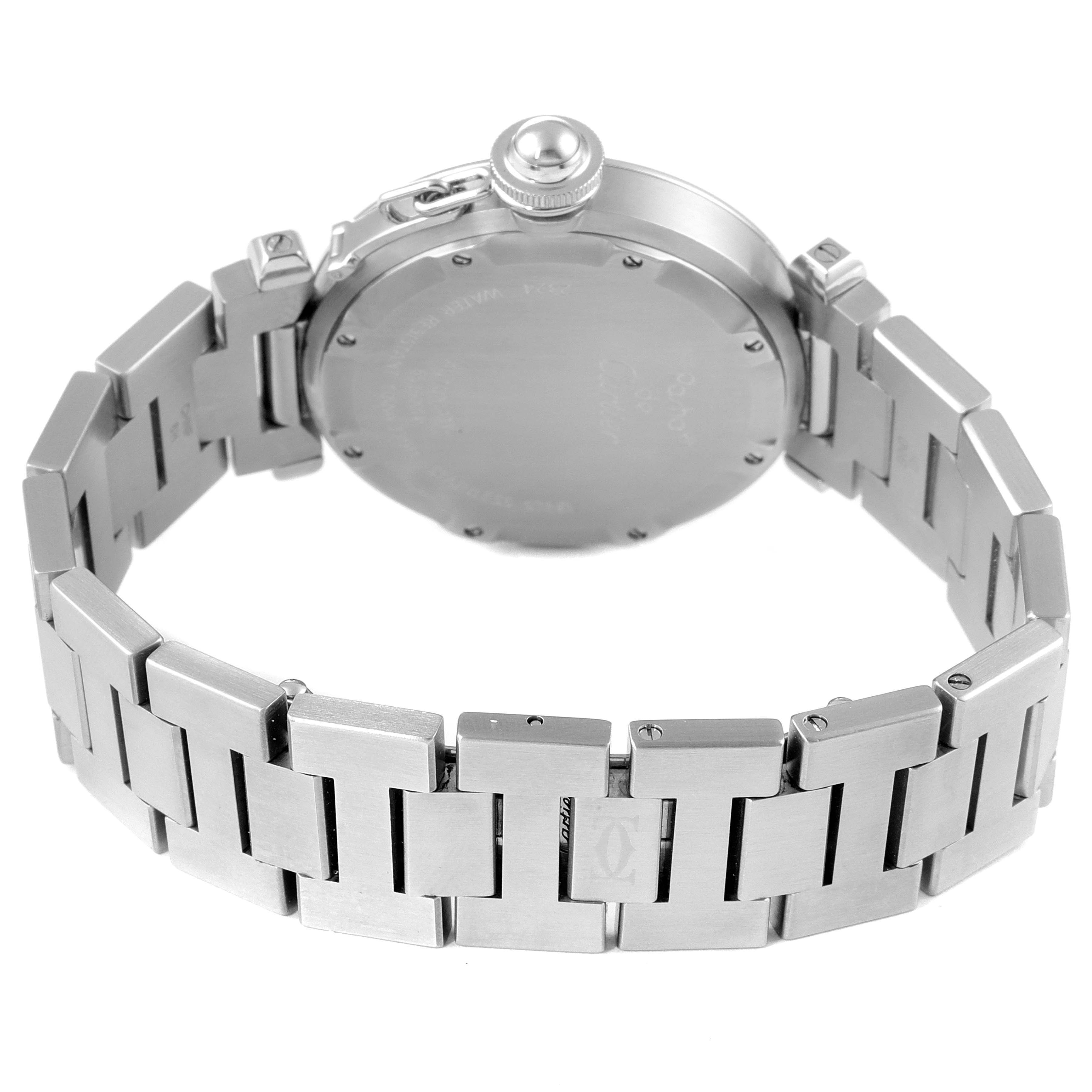 The image shows the back view of a Cartier Pasha W31075M7 Women's Stainless Steel Pink Dial W31075M7 Women's Stainless Steel Pink Dial watch, highlighting its case back and metal bracelet.