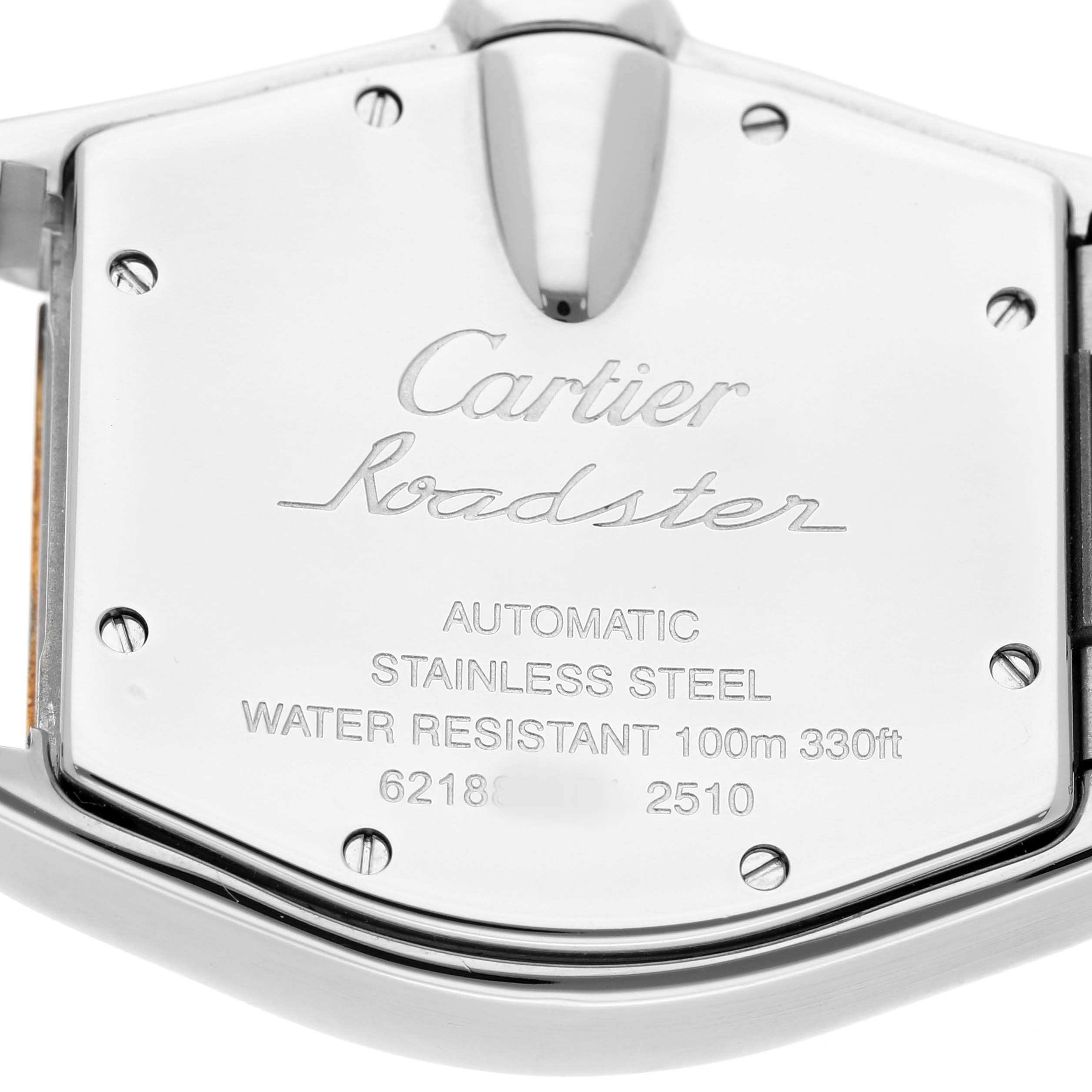 The image shows the back case of the Cartier Roadster W62031Y4 Men's Steel and Gold (two tone) Silver Dial watch with engraved details and screws visible.