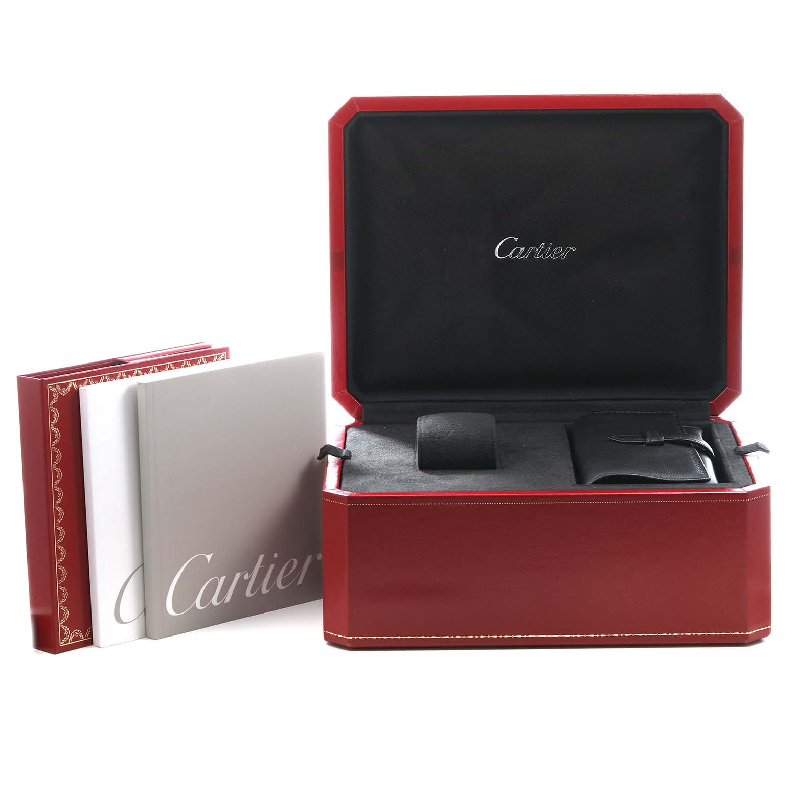 The image shows the open box and booklets for the Cartier Roadster W62002V3 Men's Stainless Steel Black Dial model watch, highlighting packaging and accessories.