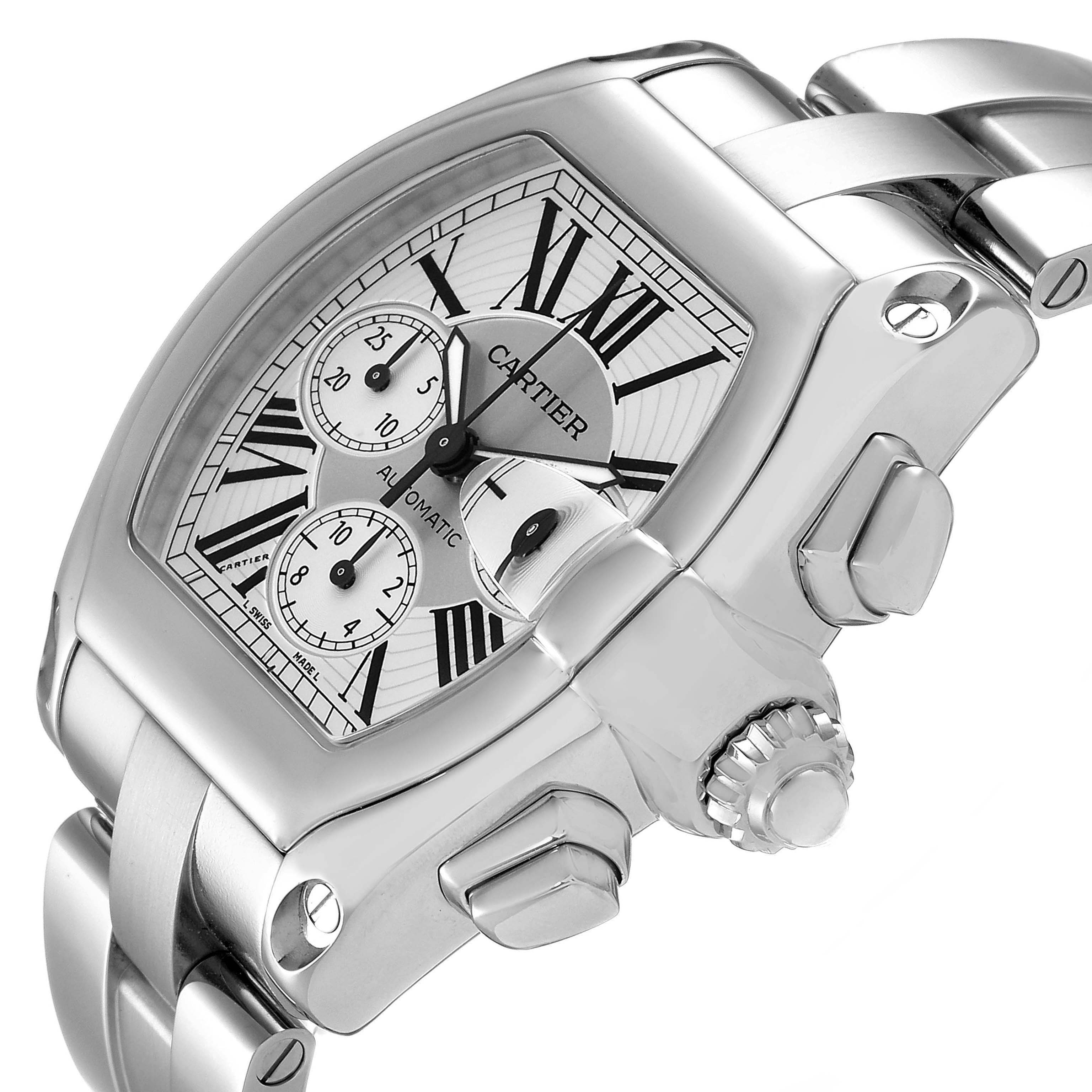 The Cartier Roadster W62019X6 Men's Stainless Steel Silver Dial watch is shown from a side angle, highlighting the case, crown, and bracelet.