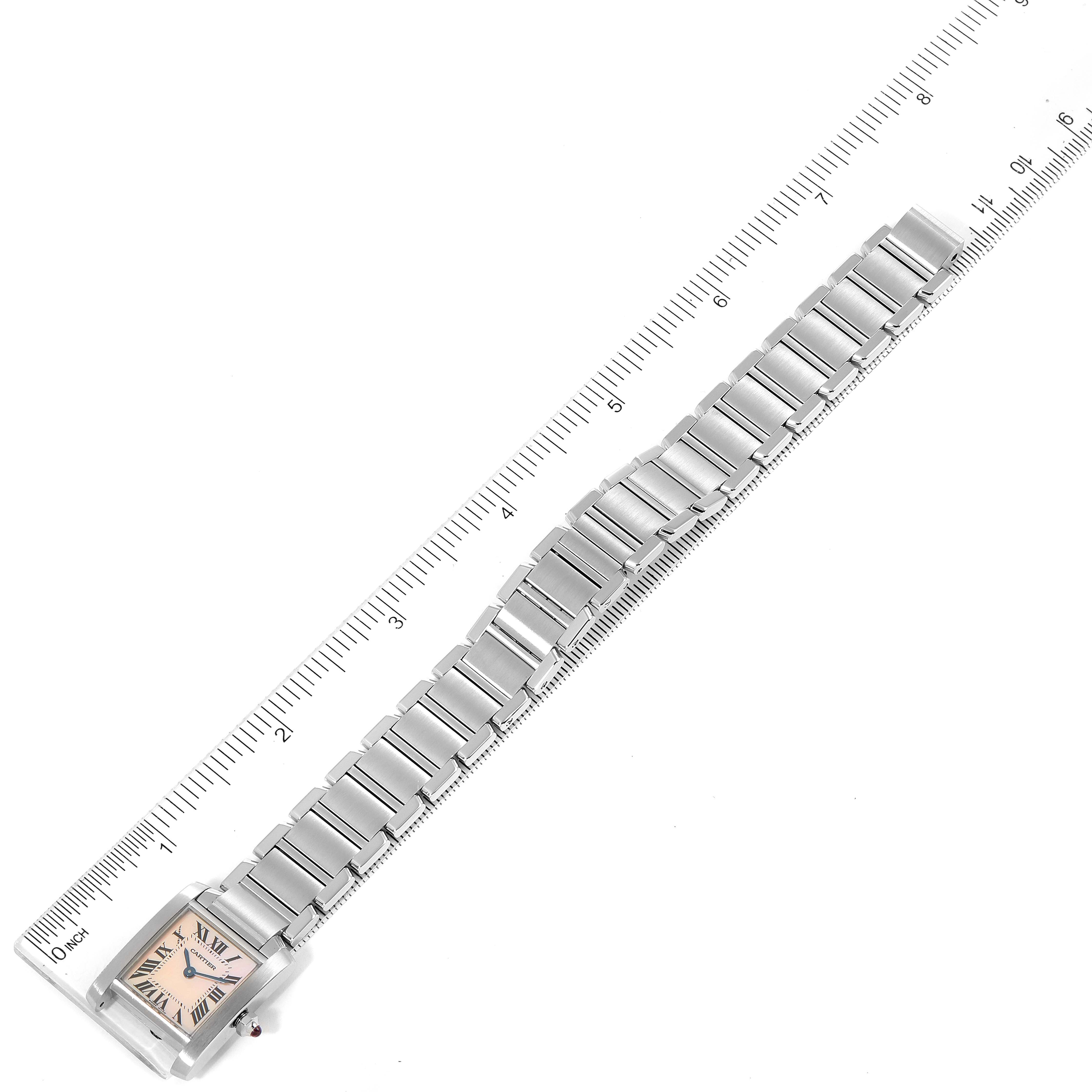 The Cartier Tank Francaise W51028Q3 Women
s Stainless Steel Mother of Pearl Dial W51028Q3 Women
s Stainless Steel Mother of Pearl Dial model watch is shown flat, including the face and entire metal bracelet, with a ruler for scale.