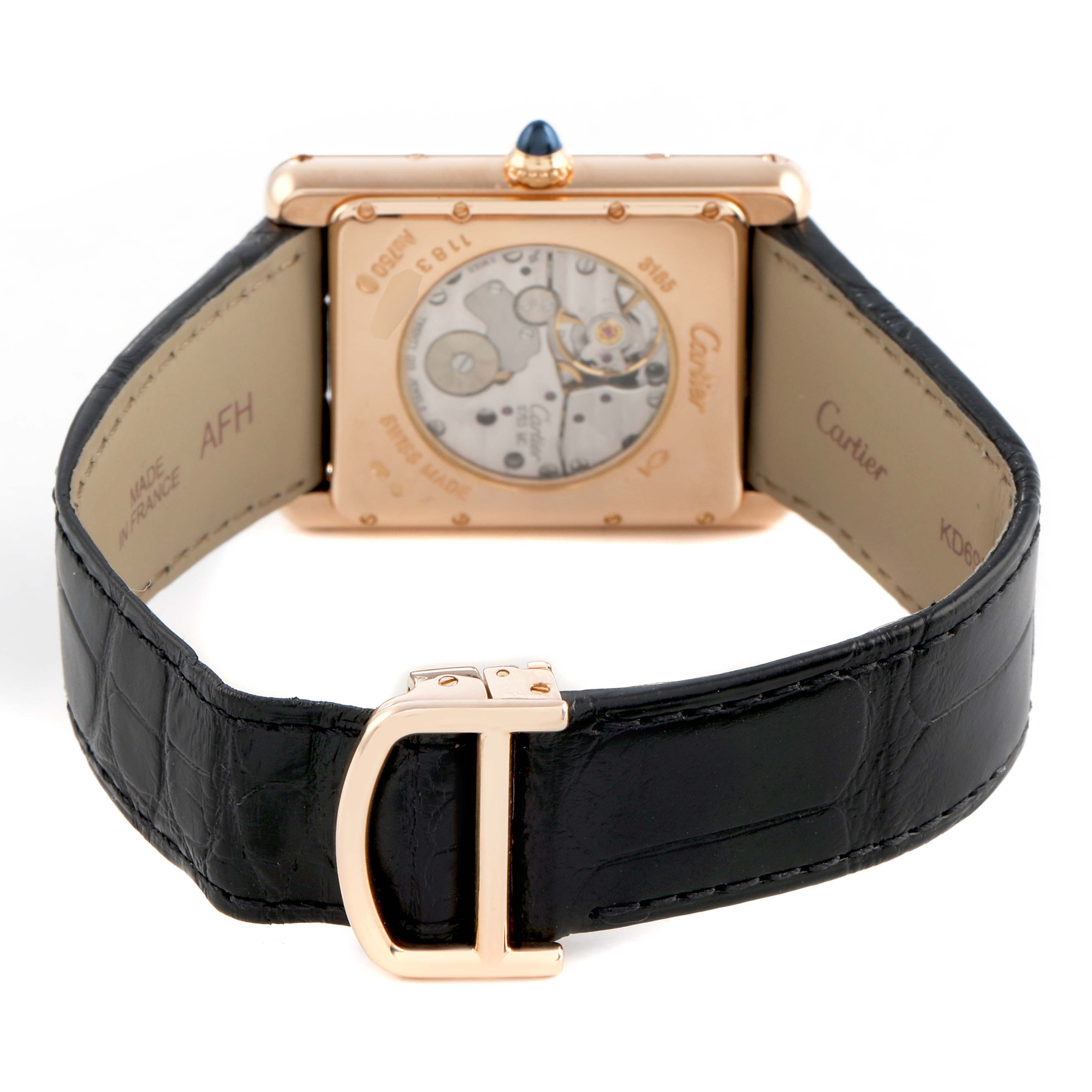 The Cartier Tank Louis W1560003 Men's Rose Gold Silver Dial watch is shown from the back, displaying its transparent caseback, strap, and folding clasp.