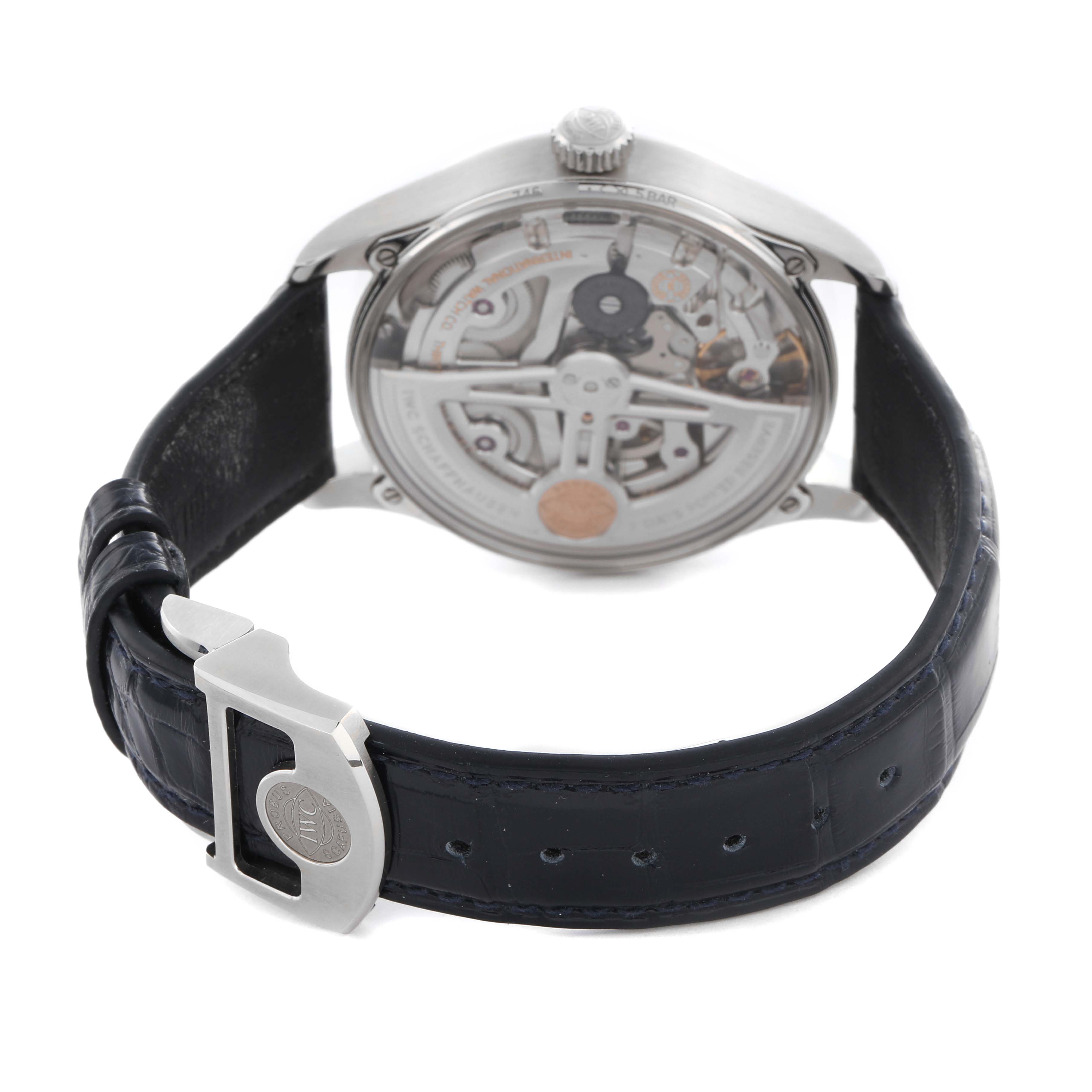 The IWC Portuguese IW501702 Men
s Stainless Steel Silver Dial IW501702 Men
s Stainless Steel Silver Dial model watch is shown from the back, highlighting its open case back and blue leather strap with a clasp.