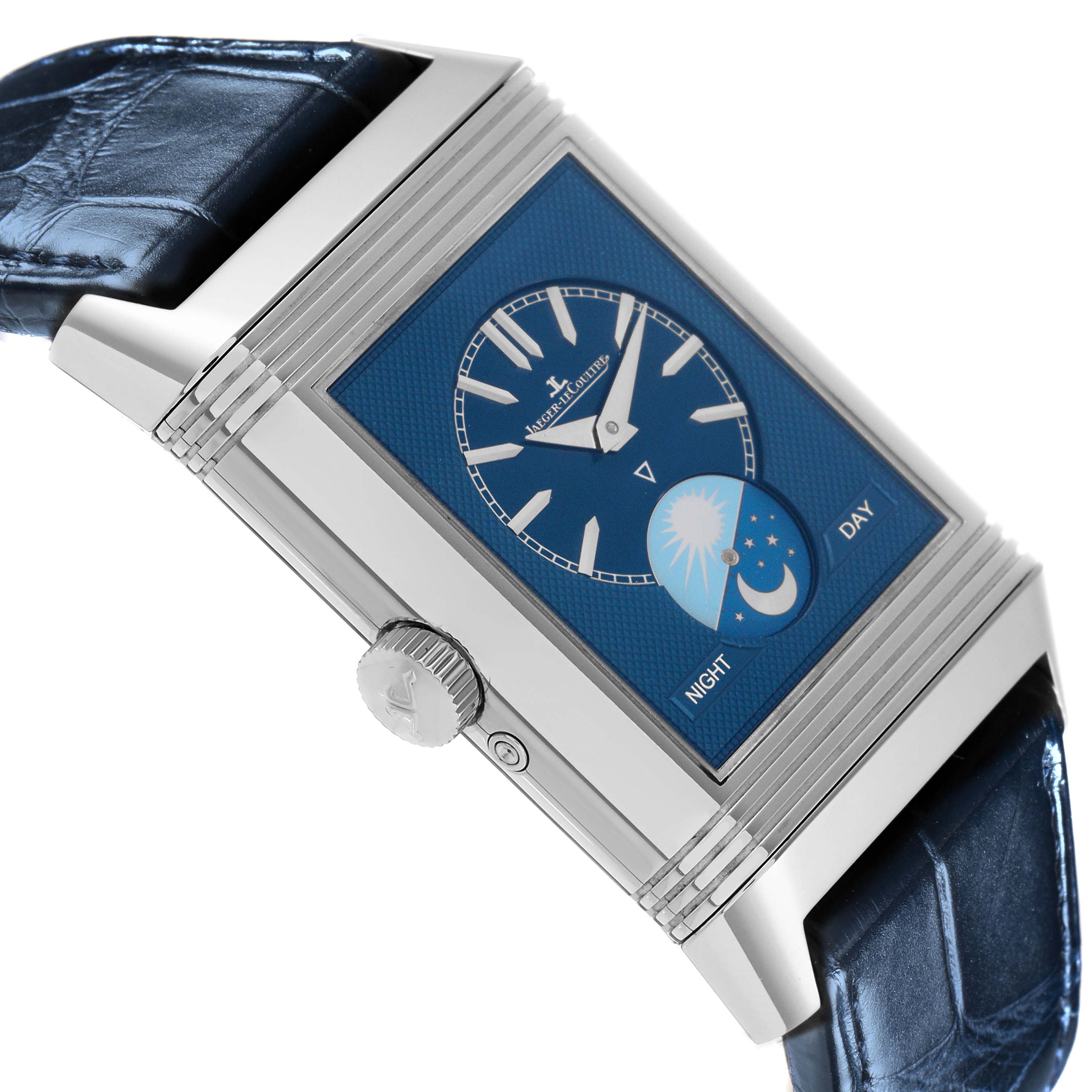 The Jaeger-LeCoultre Reverso watch is shown at a side angle displaying the crown, blue dial, and day-night indicator.