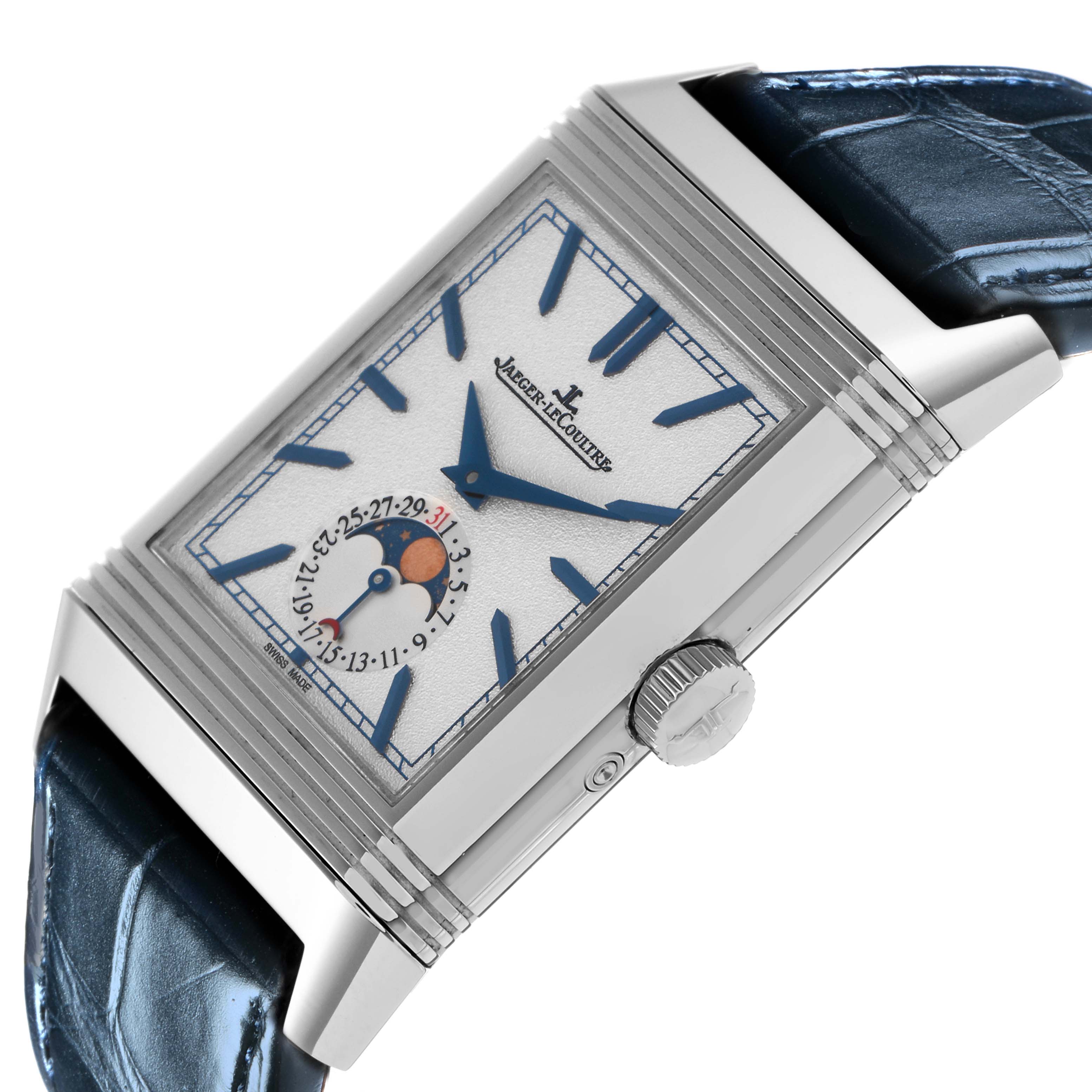 The Jaeger-LeCoultre Reverso watch is shown at an angled view, highlighting its face, crown, and partial strap.