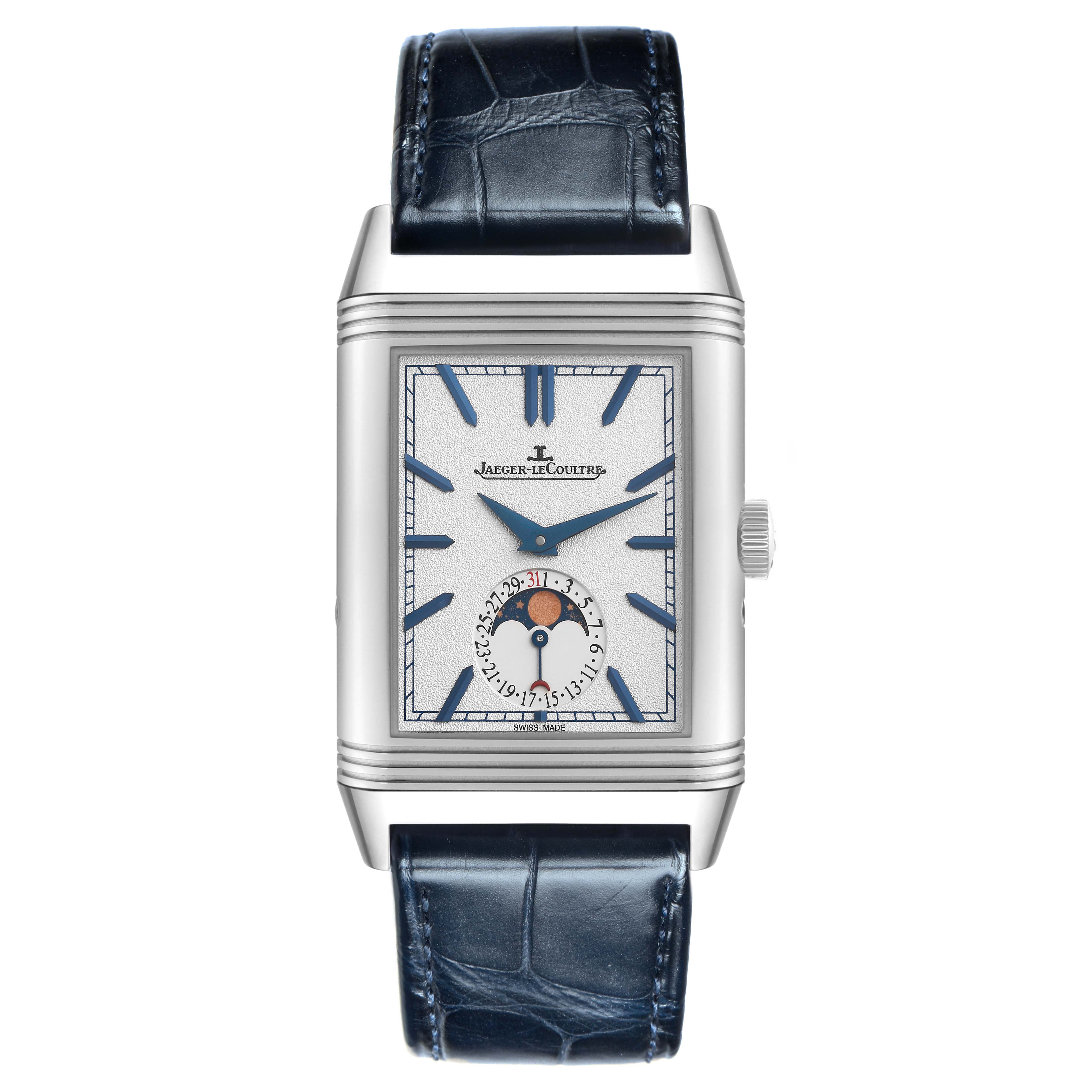 The Jaeger-LeCoultre Reverso watch is shown from a front angle, displaying its face, hands, and moon phase complication.