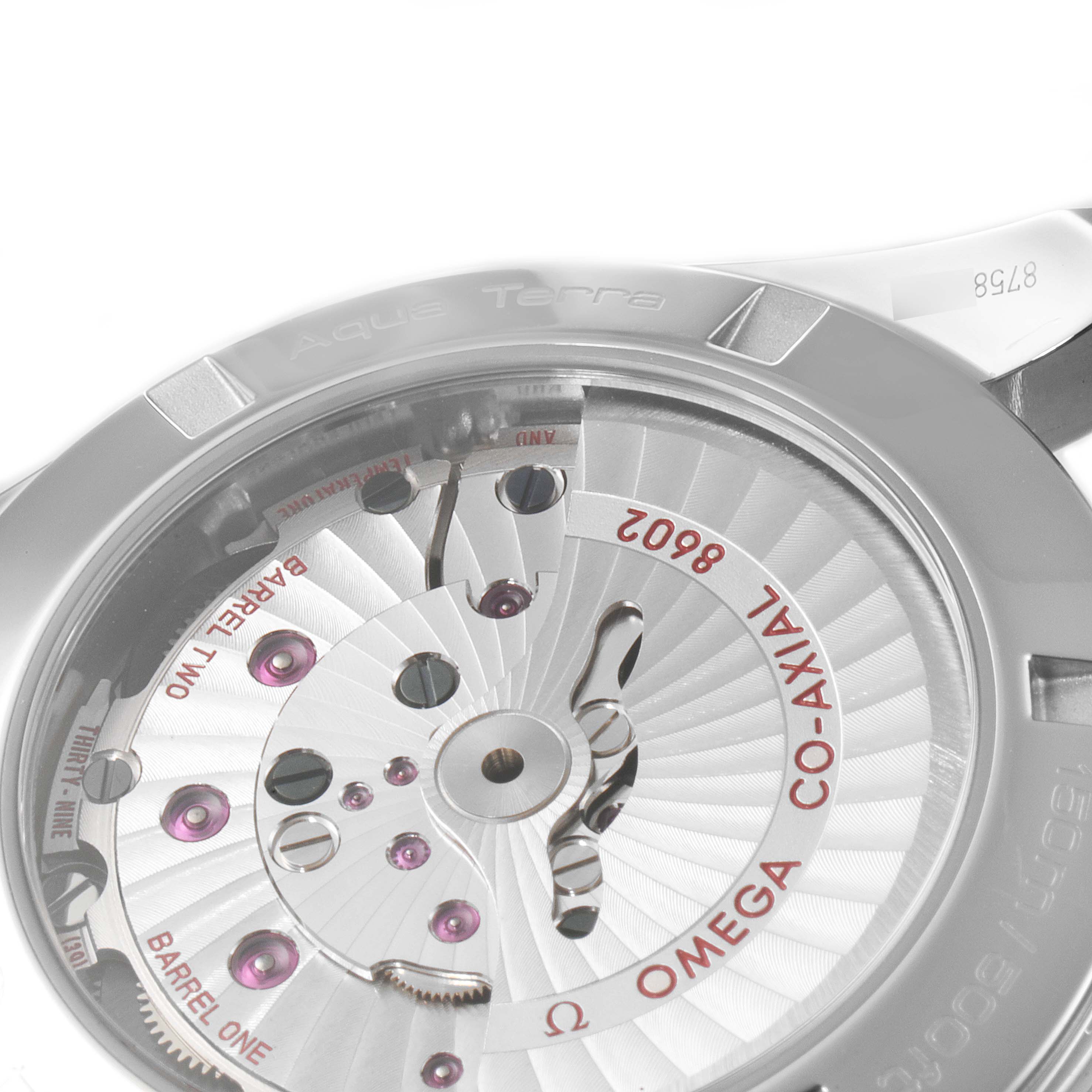 The image shows the backside of an Omega Aqua Terra 231.13.42.22.03.001 Men
s Stainless Steel Blue Dial 231.13.42.22.03.001 Men
s Stainless Steel Blue Dial watch, highlighting the internal Co-Axial movement mechanism.