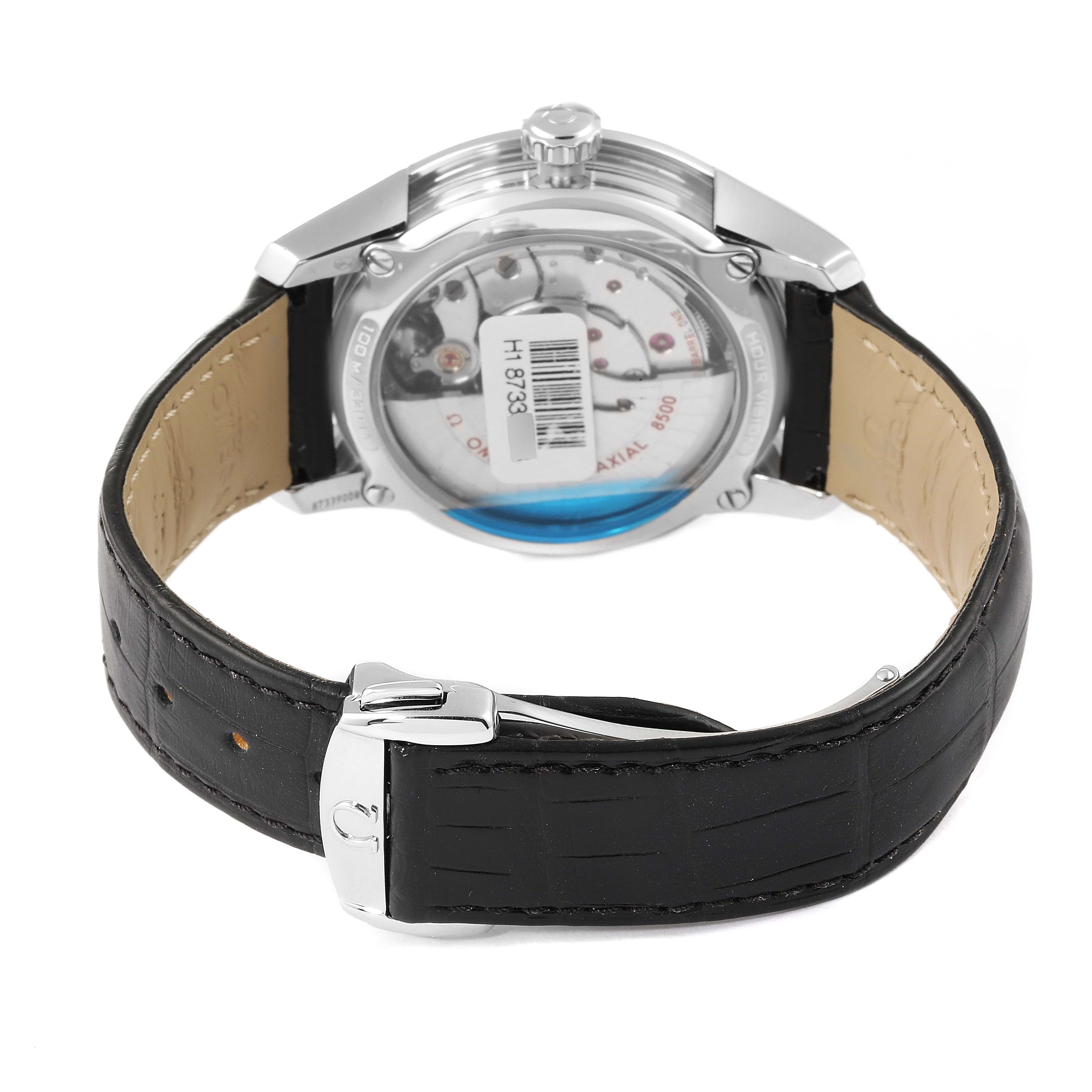 The image shows the back view of the Omega De Ville 431.33.41.21.01.001 Men
s Stainless Steel Black Dial 431.33.41.21.01.001 Men
s Stainless Steel Black Dial watch, highlighting its movement and leather strap with a clasp.