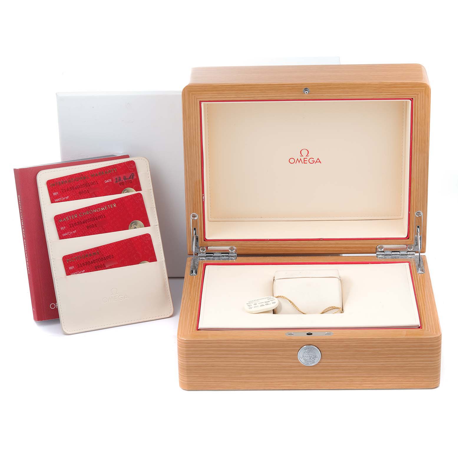 The image shows an Omega watch box for the Planet Ocean model and accompanying documentation cards.