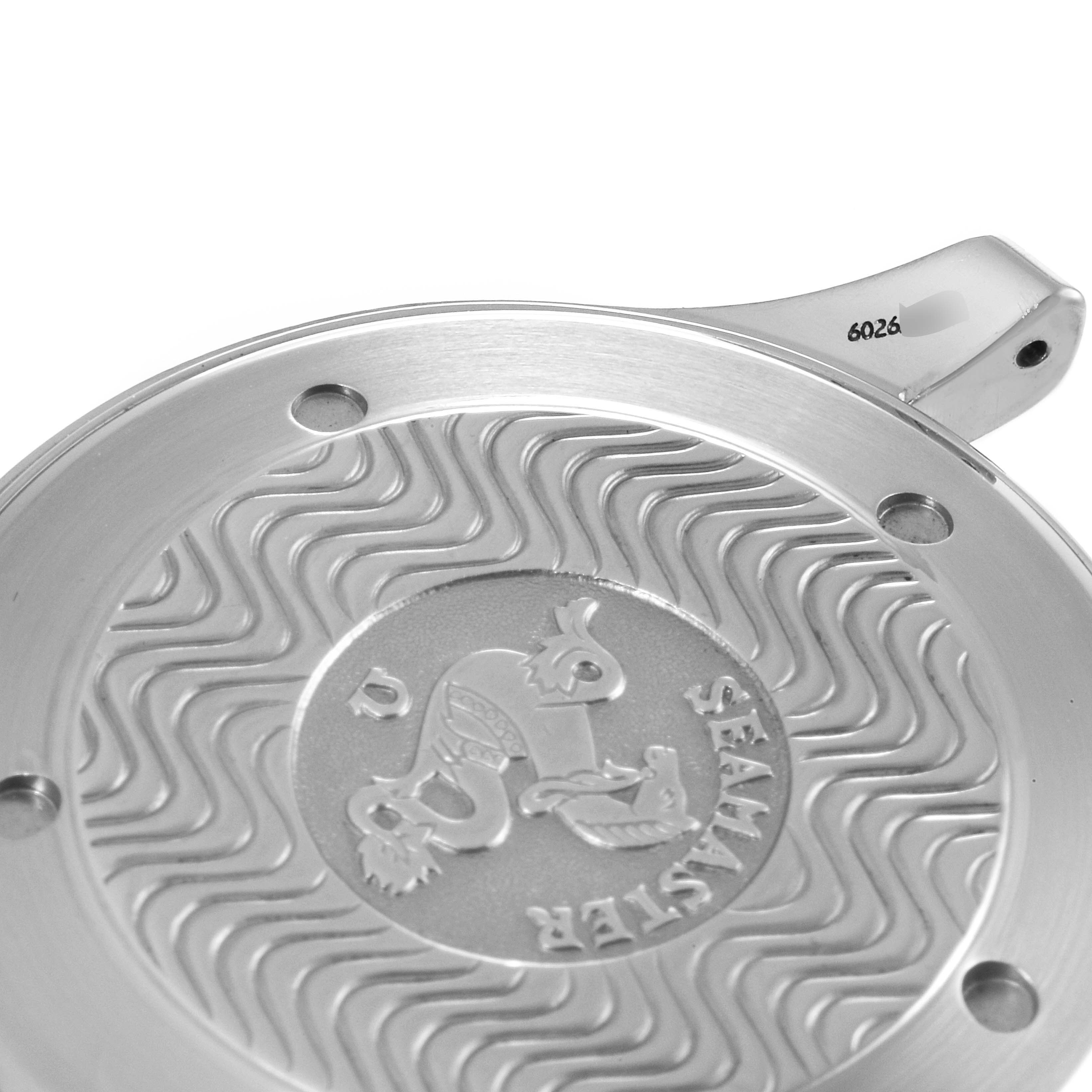 This image shows the engraved back case of an Omega Seamaster 2531.80.00 Men
s Stainless Steel Blue Dial 2531.80.00 Men
s Stainless Steel Blue Dial watch from a close-up angle.