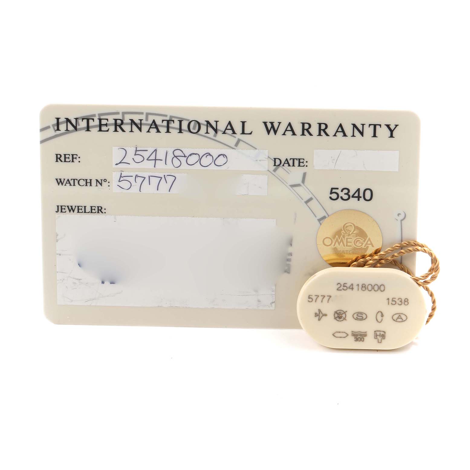 The image shows the international warranty card and a tag for the Omega Seamaster 2541.80.00 Men
s Stainless Steel Blue Dial 2541.80.00 Men
s Stainless Steel Blue Dial watch, with reference and watch numbers visible.