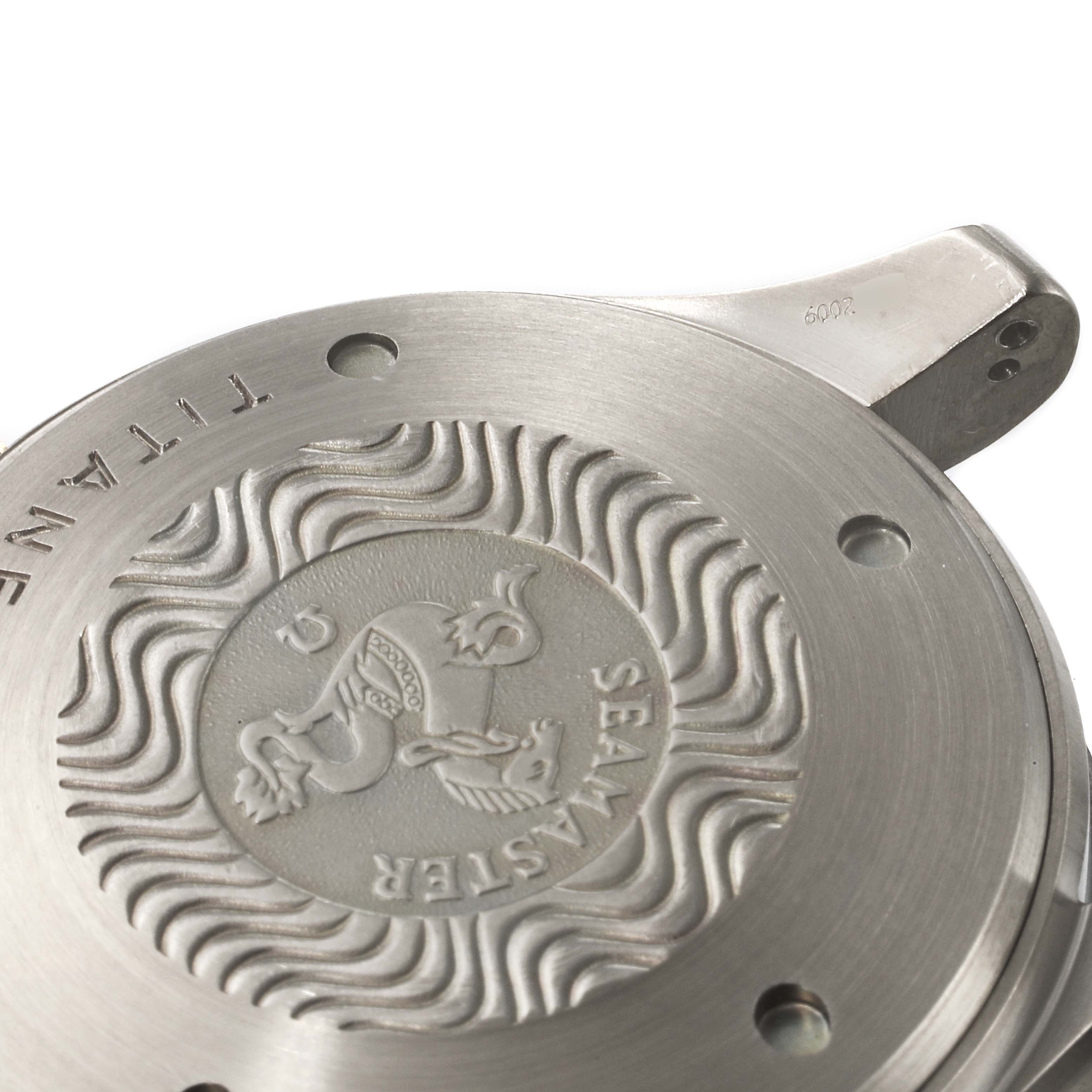 This image shows the case back of an Omega Seamaster 2296.80.00 Men
s Titanium Blue Dial 2296.80.00 Men
s Titanium Blue Dial watch, emphasizing its engravings and metal construction.