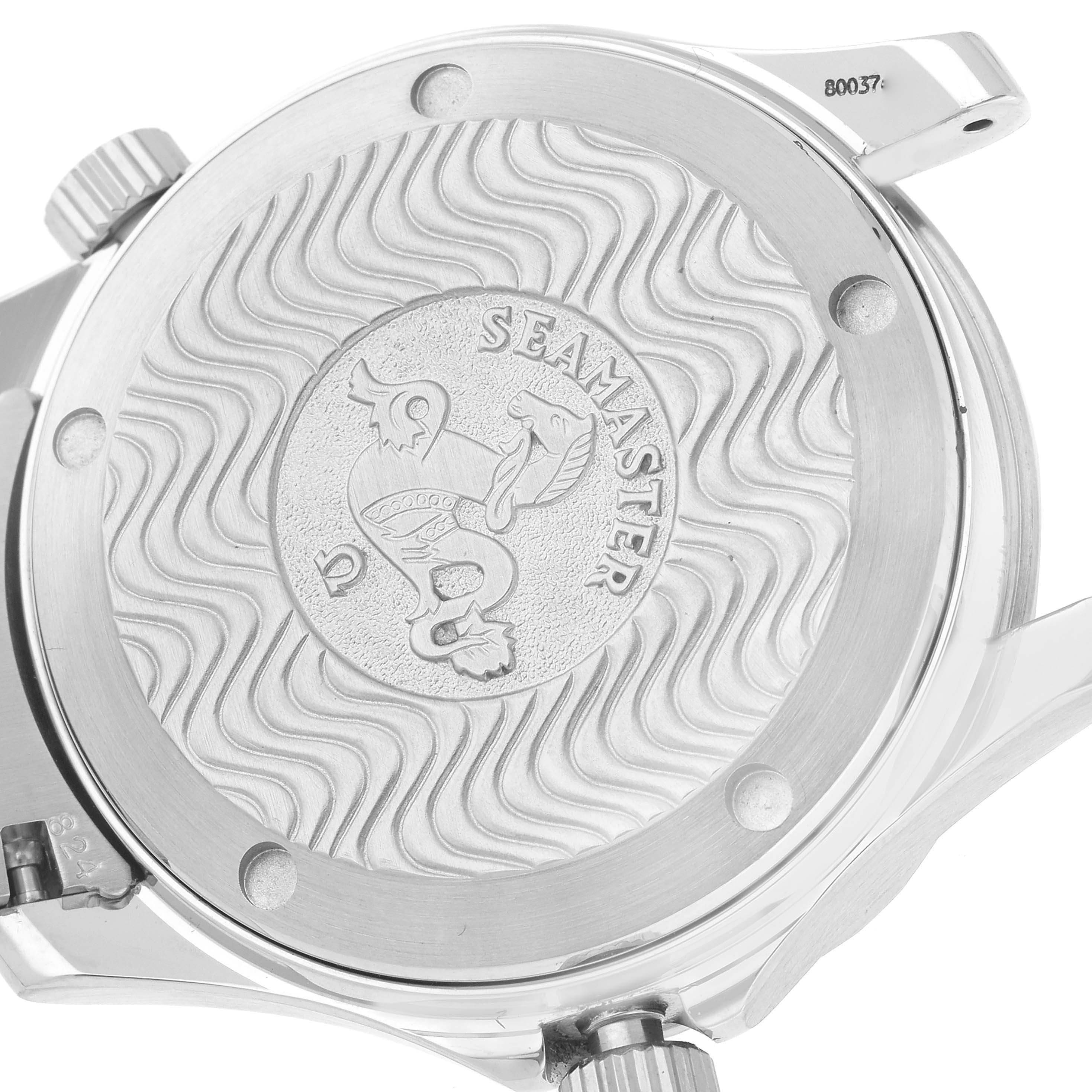 The image shows the back case of an Omega Seamaster 2551.80.00 Men
s Stainless Steel Blue Dial 2551.80.00 Men
s Stainless Steel Blue Dial watch with the wavy engravings and brand logo.