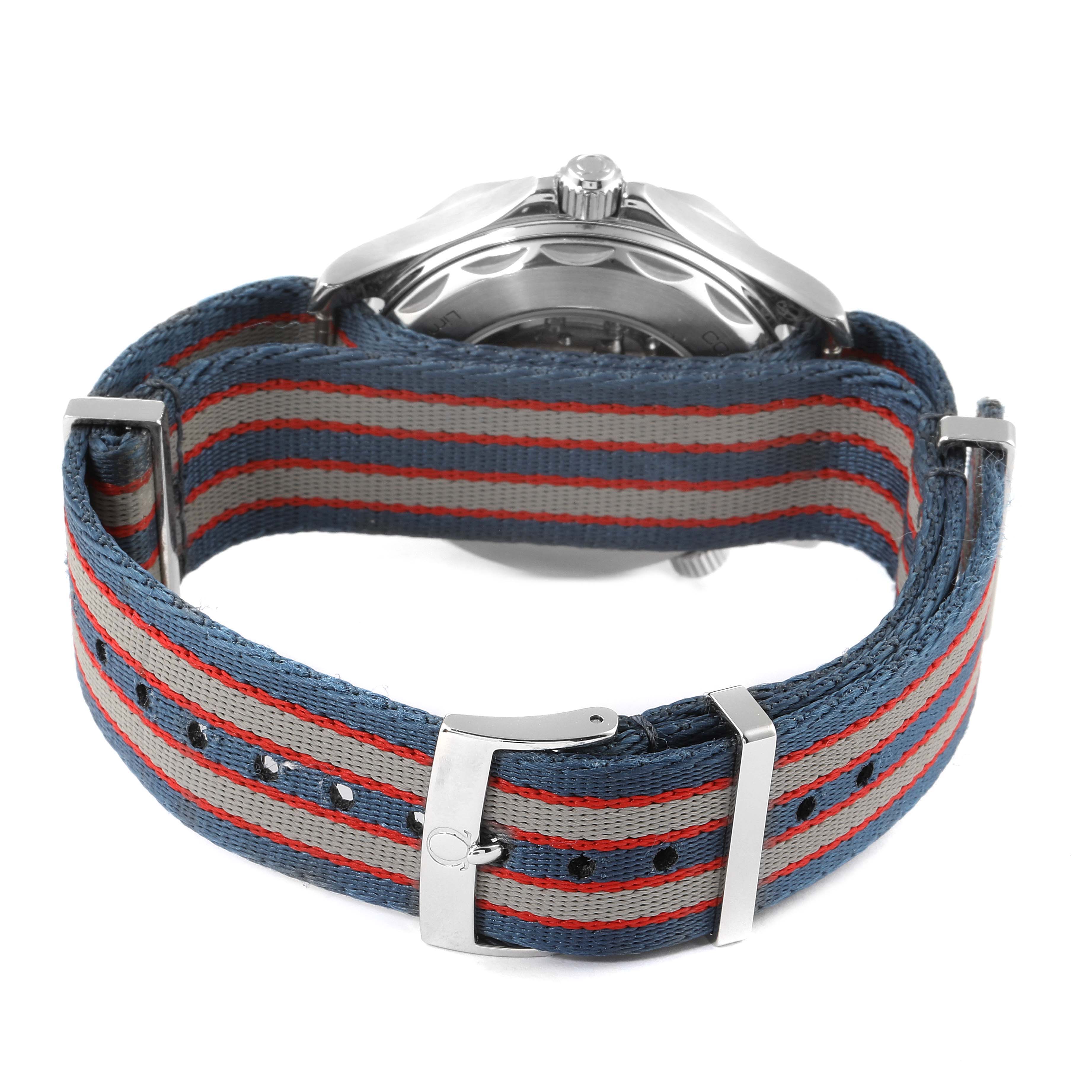 The image shows the back of the Omega Seamaster 212.32.41.20.04.001 Men's Stainless Steel White Dial 212.32.41.20.04.001 Men's Stainless Steel White Dial watch with a striped fabric strap and metal buckle.