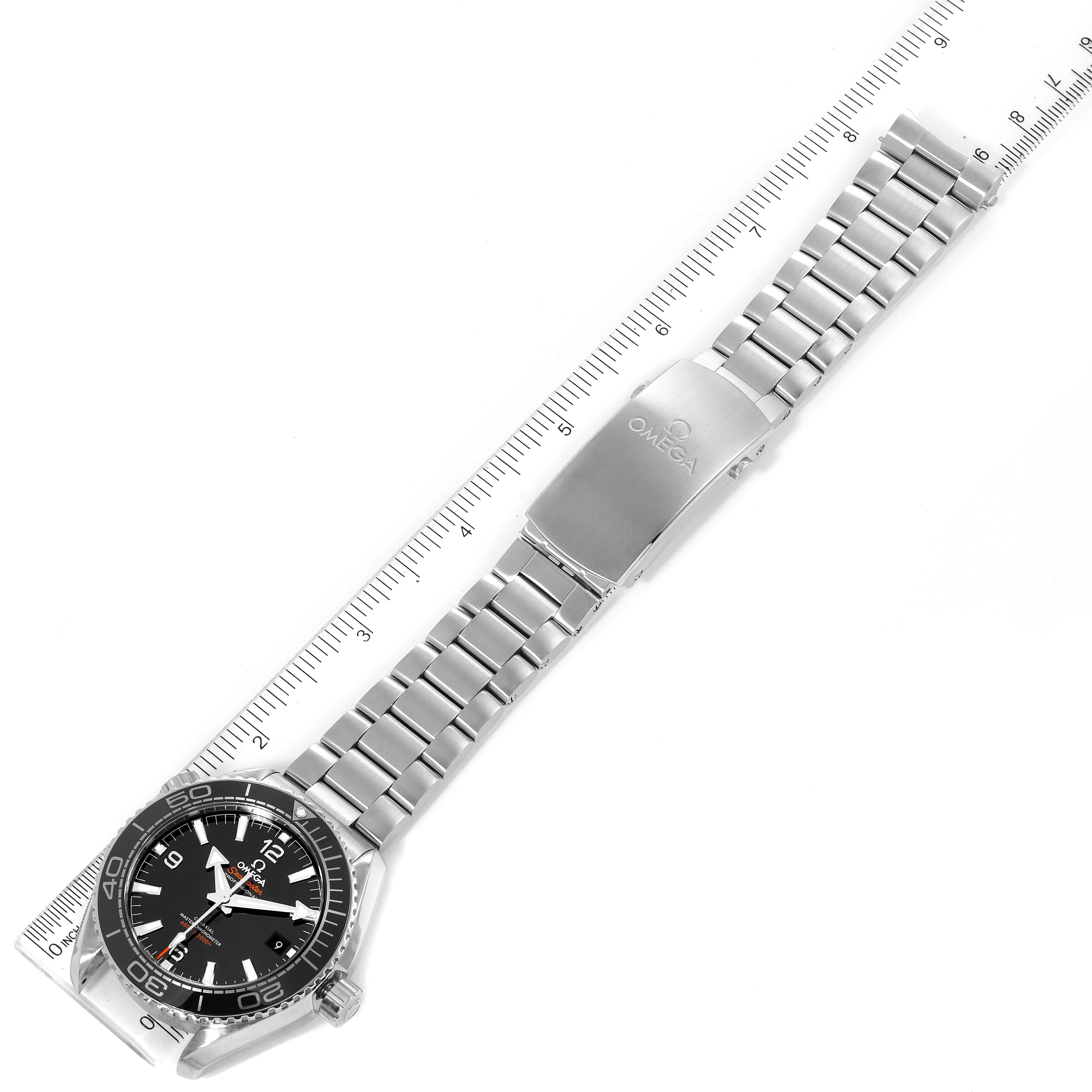 The image shows an overhead view of the Omega Planet Ocean 215.30.44.21.01.001 Men
s Stainless Steel Black Dial 215.30.44.21.01.001 Men
s Stainless Steel Black Dial watch, including its face, bezel, and stainless steel bracelet with clasp.