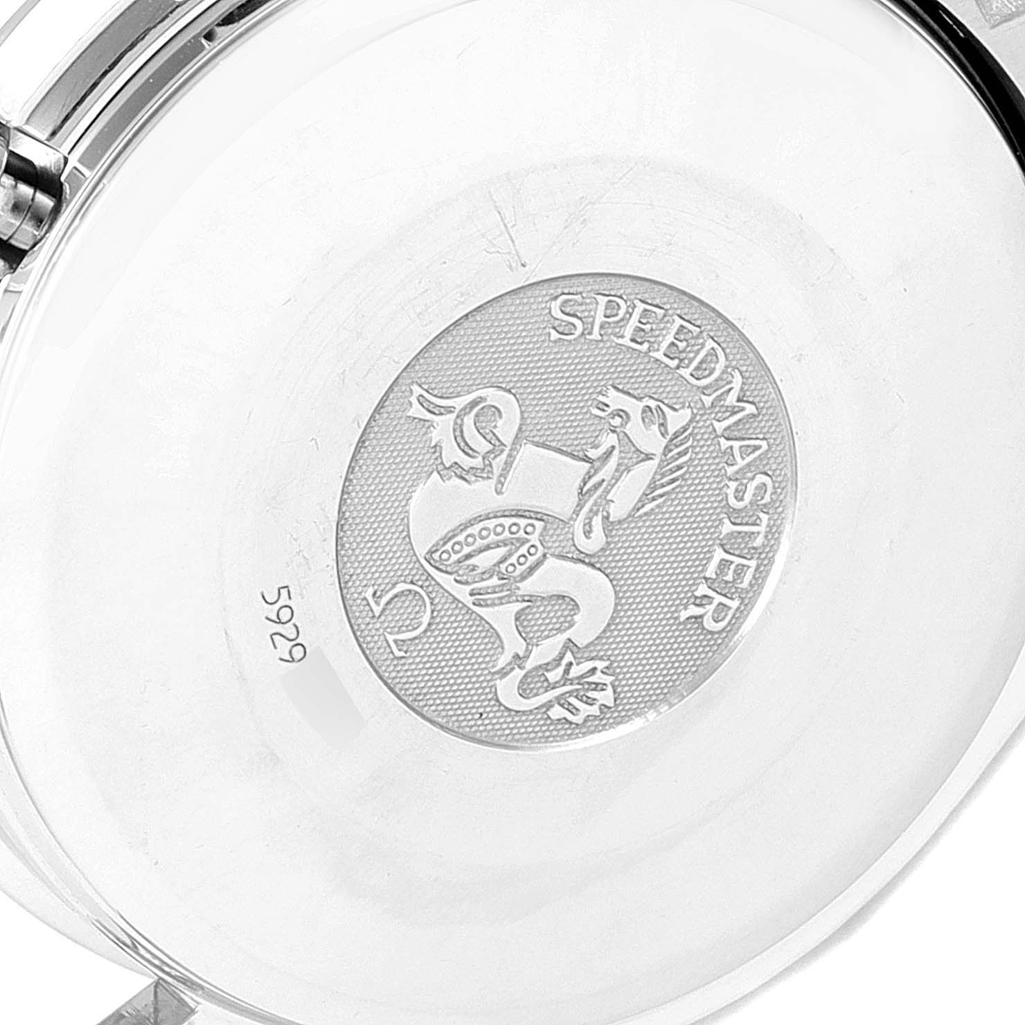 This image shows a close-up of the back case of an Omega Speedmaster 3513.54.00 Men
s Stainless Steel Black Dial 3513.54.00 Men
s Stainless Steel Black Dial watch, displaying its engraved emblem.