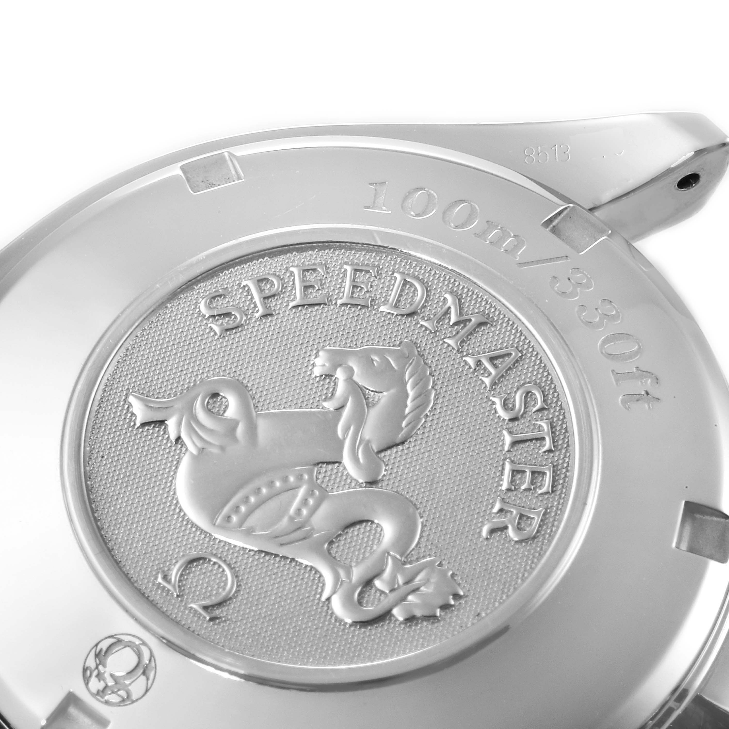 The image shows the Omega Speedmaster 323.30.40.40.04.001 Men
s Stainless Steel White Dial 323.30.40.40.04.001 Men
s Stainless Steel White Dial watch case back, highlighting its engravings and emblem.