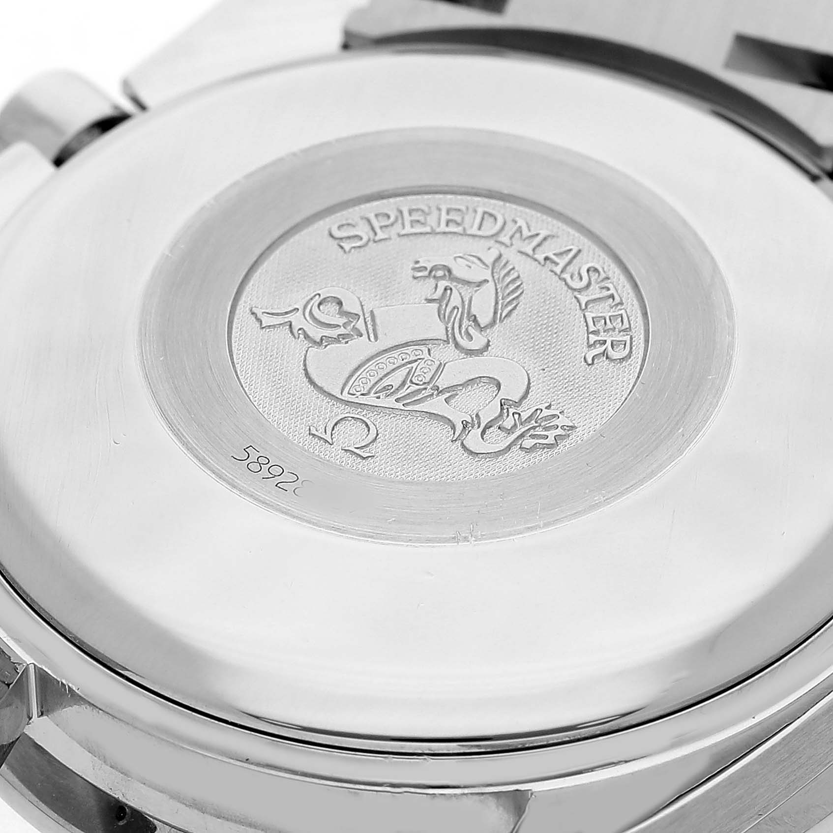 The image shows the back of the Omega Speedmaster 3210.50.00 Men's Stainless Steel Black Dial watch, highlighting the engraved emblem and model name.