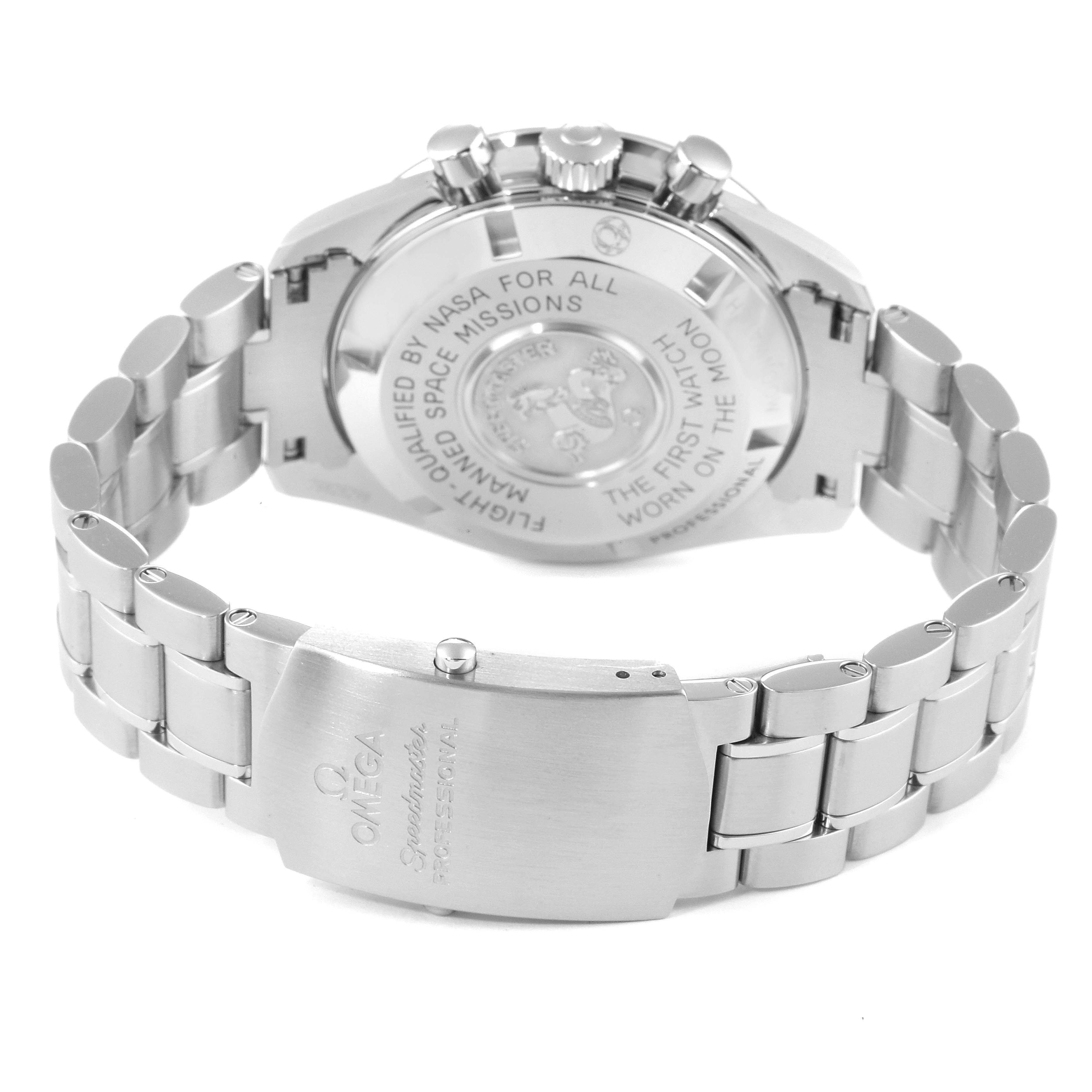 The image shows the back and clasp of an Omega Speedmaster 311.30.42.30.01.005 Men
s Stainless Steel Black Dial 311.30.42.30.01.005 Men
s Stainless Steel Black Dial watch, highlighting the engraved case back and metal bracelet.