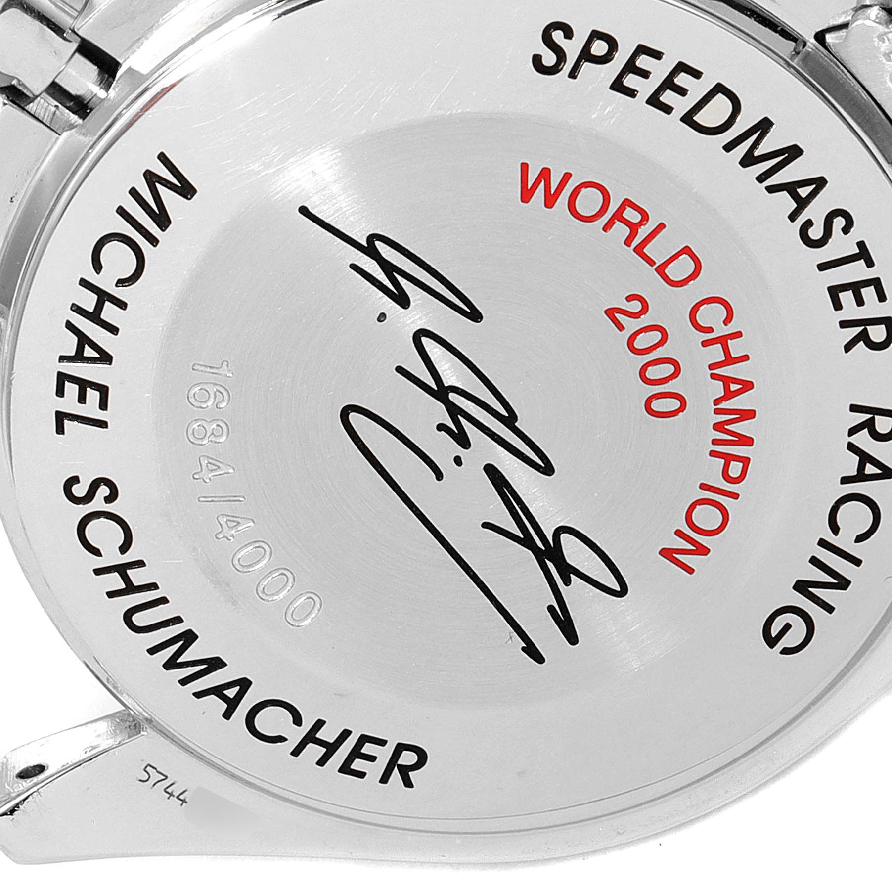 This image shows the back case of an Omega Speedmaster 3517.30.00 Men's Stainless Steel Silver Dial 3517.30.00 Men's Stainless Steel Silver Dial Racing watch with engravings commemorating Michael Schumacher's 2000 World Championship.