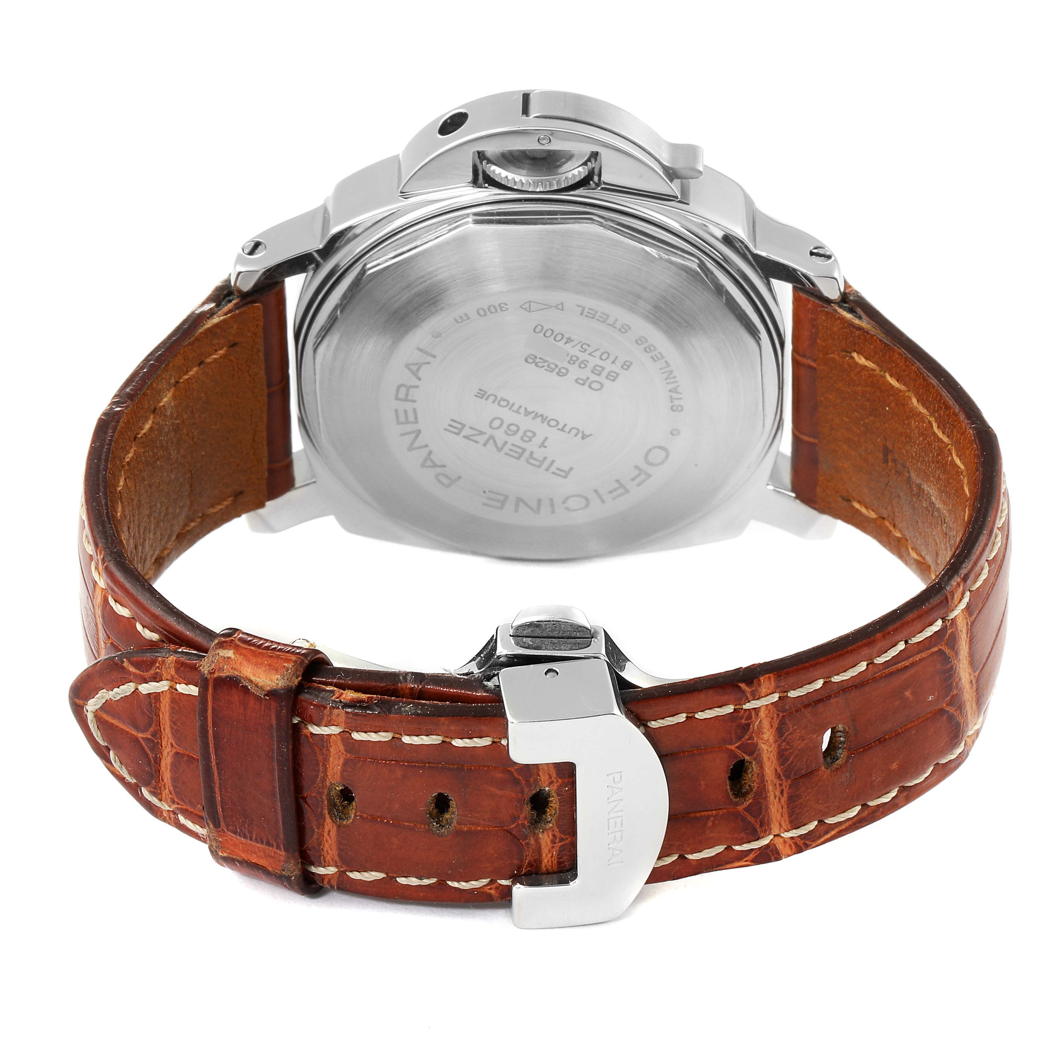 The image shows the back view of a Panerai Luminor PAM00049 Men
s Stainless Steel White Dial PAM00049 Men
s Stainless Steel White Dial watch, highlighting the case back, crown, and leather strap with buckle.