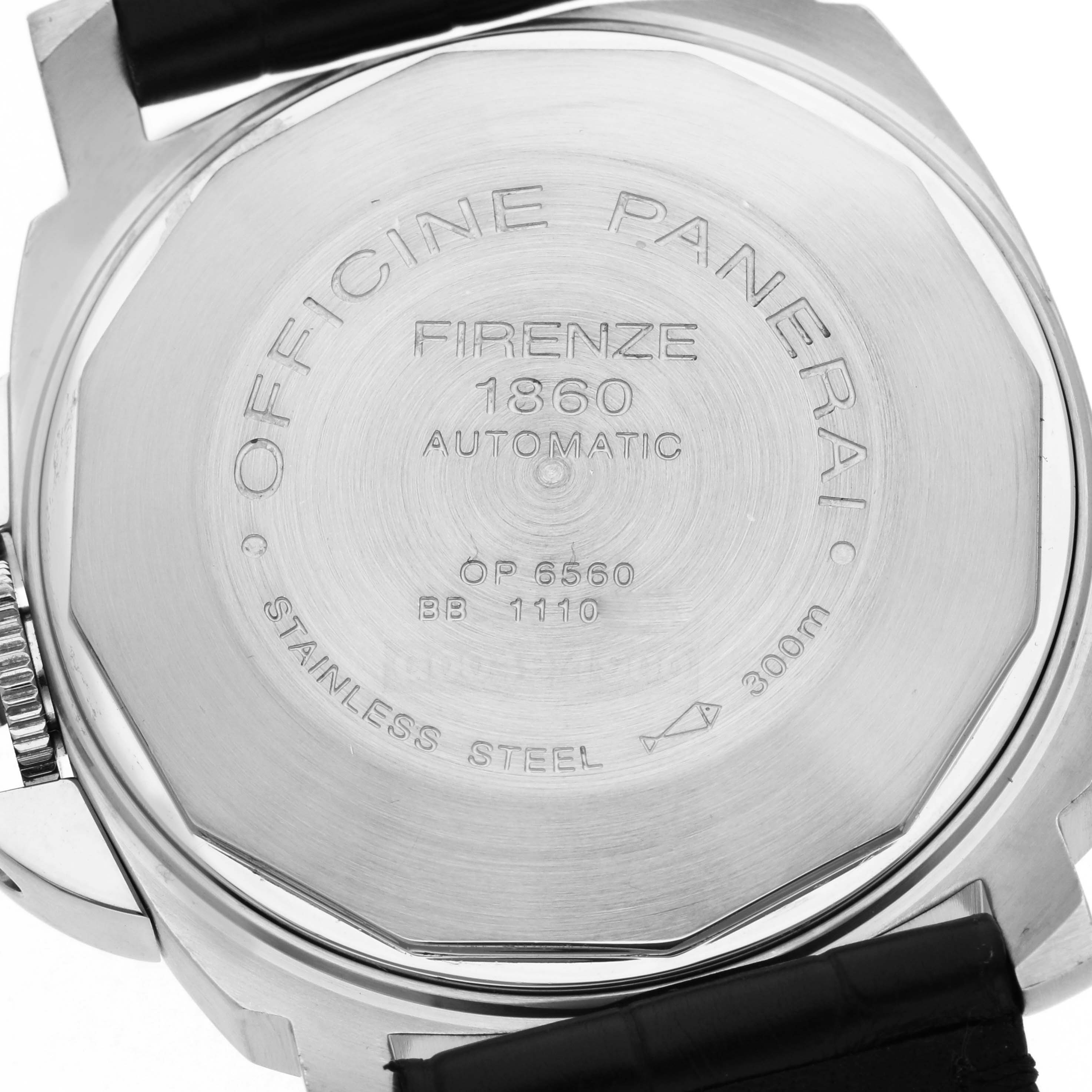 The image shows the back of a Panerai Luminor PAM00048 Men
s Stainless Steel Black Dial PAM00048 Men
s Stainless Steel Black Dial watch, highlighting the engraved details and stainless steel case.