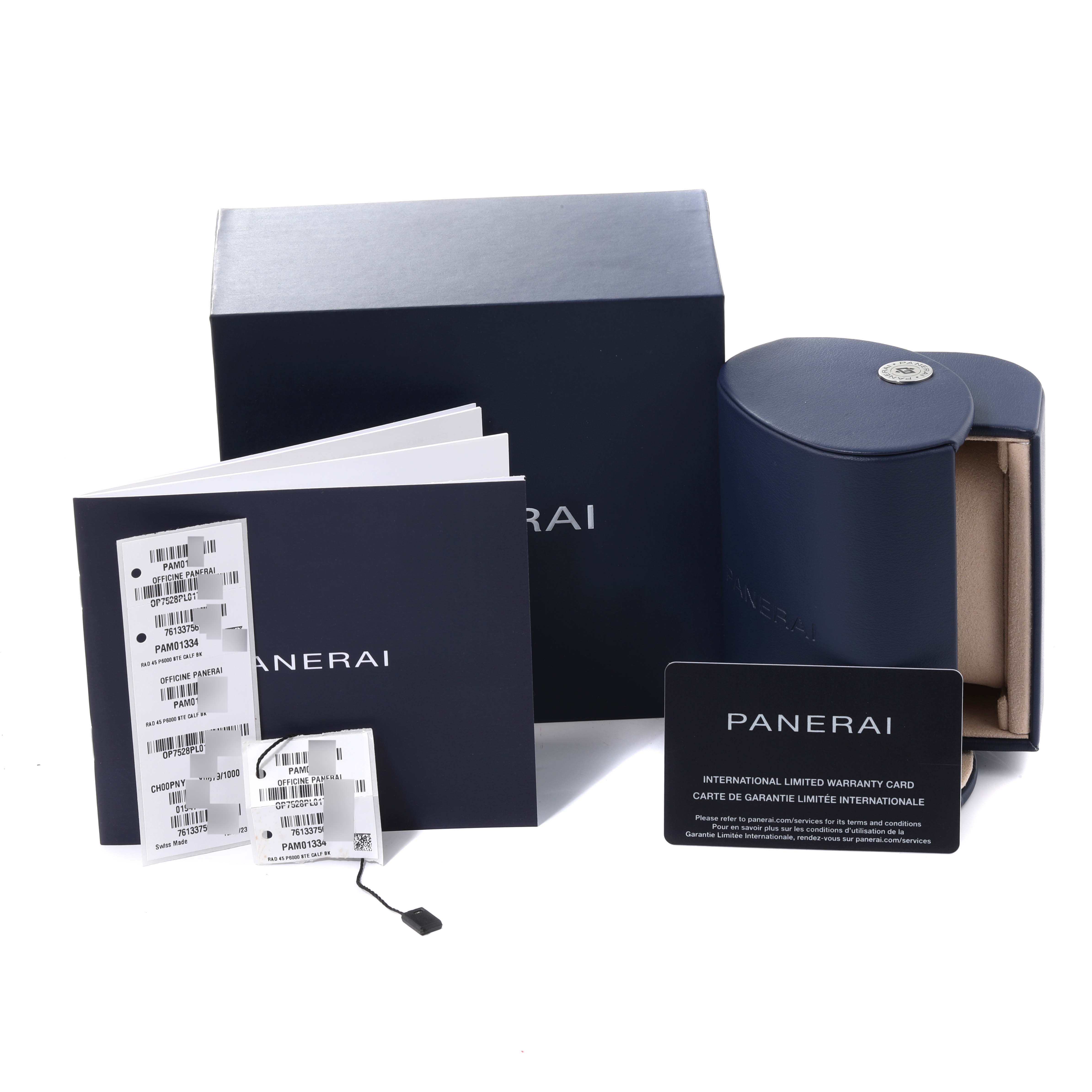 The image shows packaging and accessories for a Panerai Radiomir PAM01334 Men's Stainless Steel Black Dial PAM01334 Men's Stainless Steel Black Dial watch, including boxes, warranty cards, and labels.
