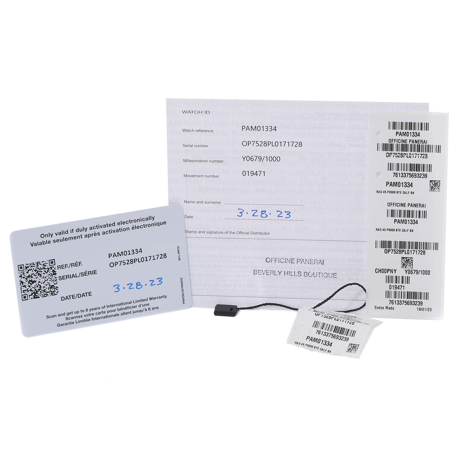 This image shows warranty paperwork and identification tags for a Panerai Radiomir PAM01334 Men's Stainless Steel Black Dial PAM01334 Men's Stainless Steel Black Dial PAM01334 watch.