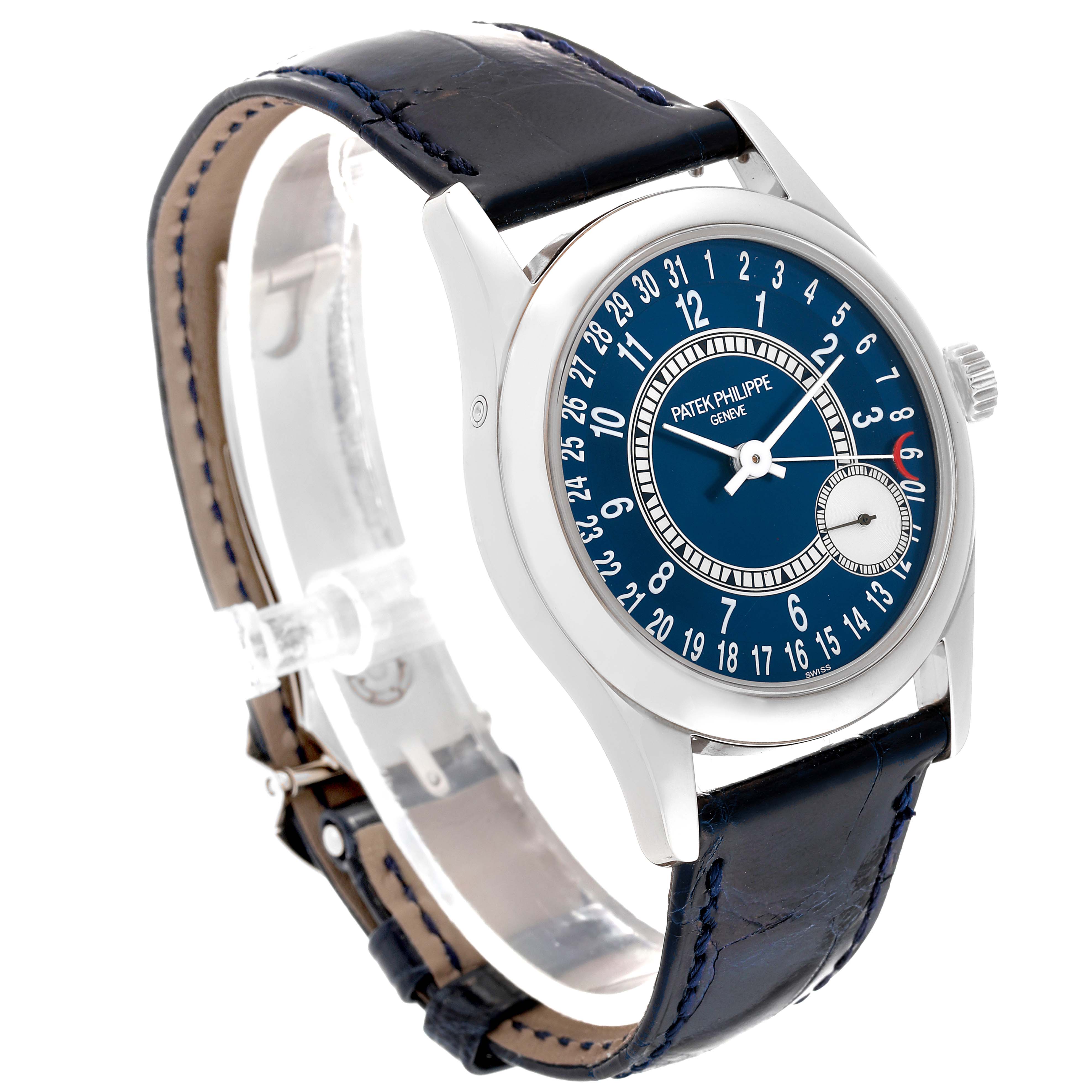 The image shows a Patek Philippe Calatrava 6000G-012 Men's White Gold Blue Dial 6000G-012 Men's White Gold Blue Dial watch at a front-left angle, displaying the blue dial, numerals, case, and leather strap.