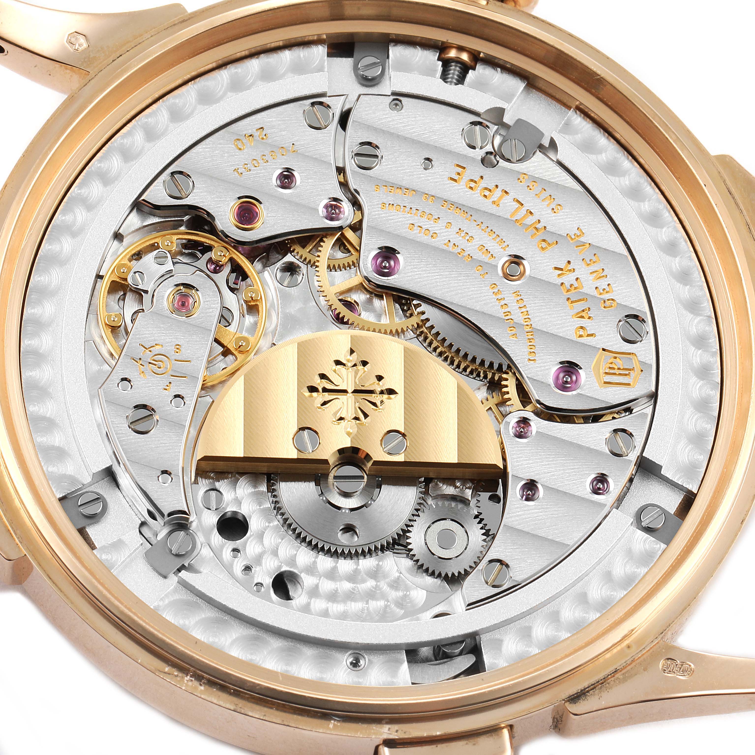 This close-up image shows the intricate inner workings and mechanical components of the Patek Philippe Complications 5230R Men's Rose Gold Grey Dial 5230R Men's Rose Gold Grey Dial model watch.