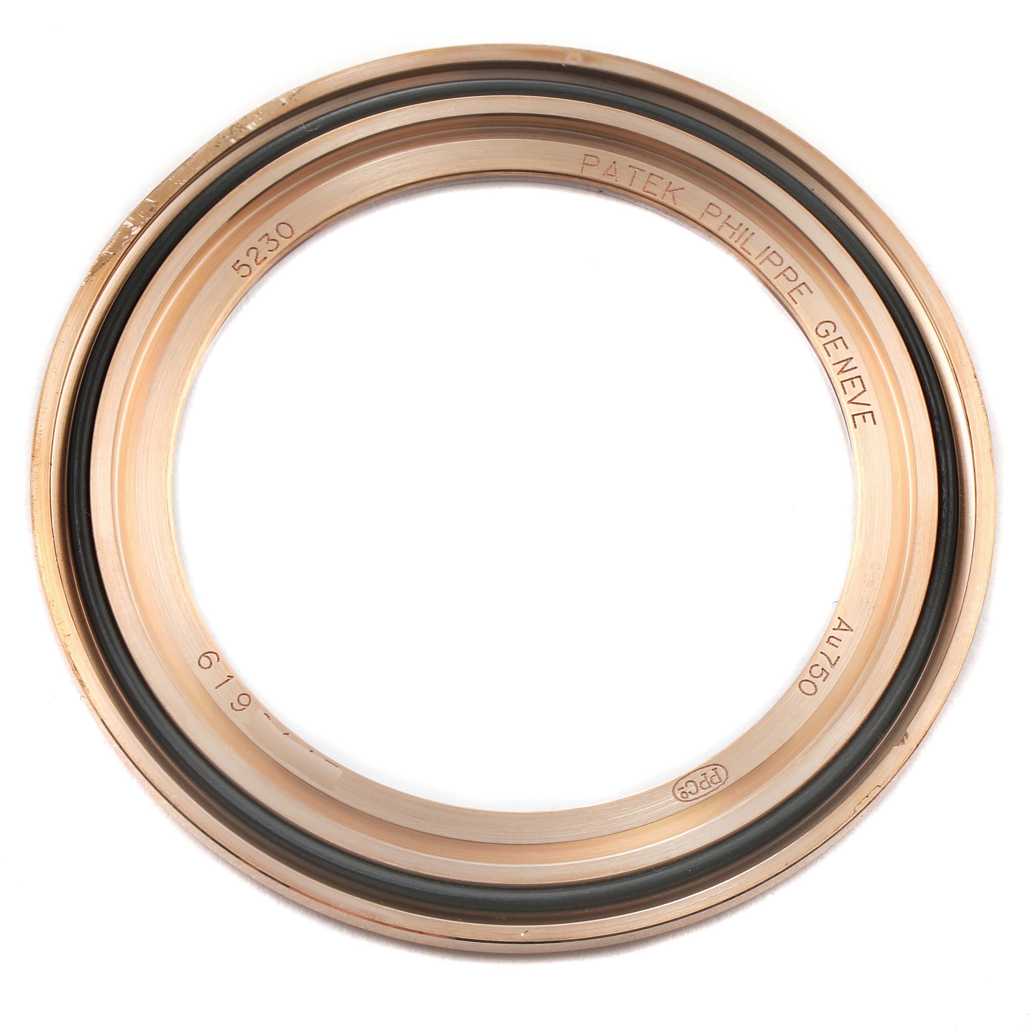 This image shows the bezel of a Patek Philippe Complications 5230R Men's Rose Gold Grey Dial 5230R Men's Rose Gold Grey Dial model watch from a top view.