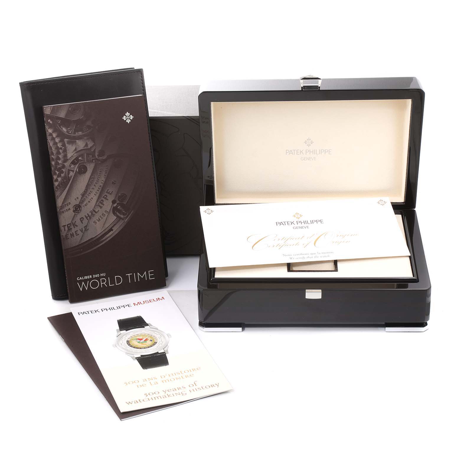 This image shows the box, papers, and manuals for the Patek Philippe Complications 5230R Men's Rose Gold Grey Dial 5230R Men's Rose Gold Grey Dial model watch.