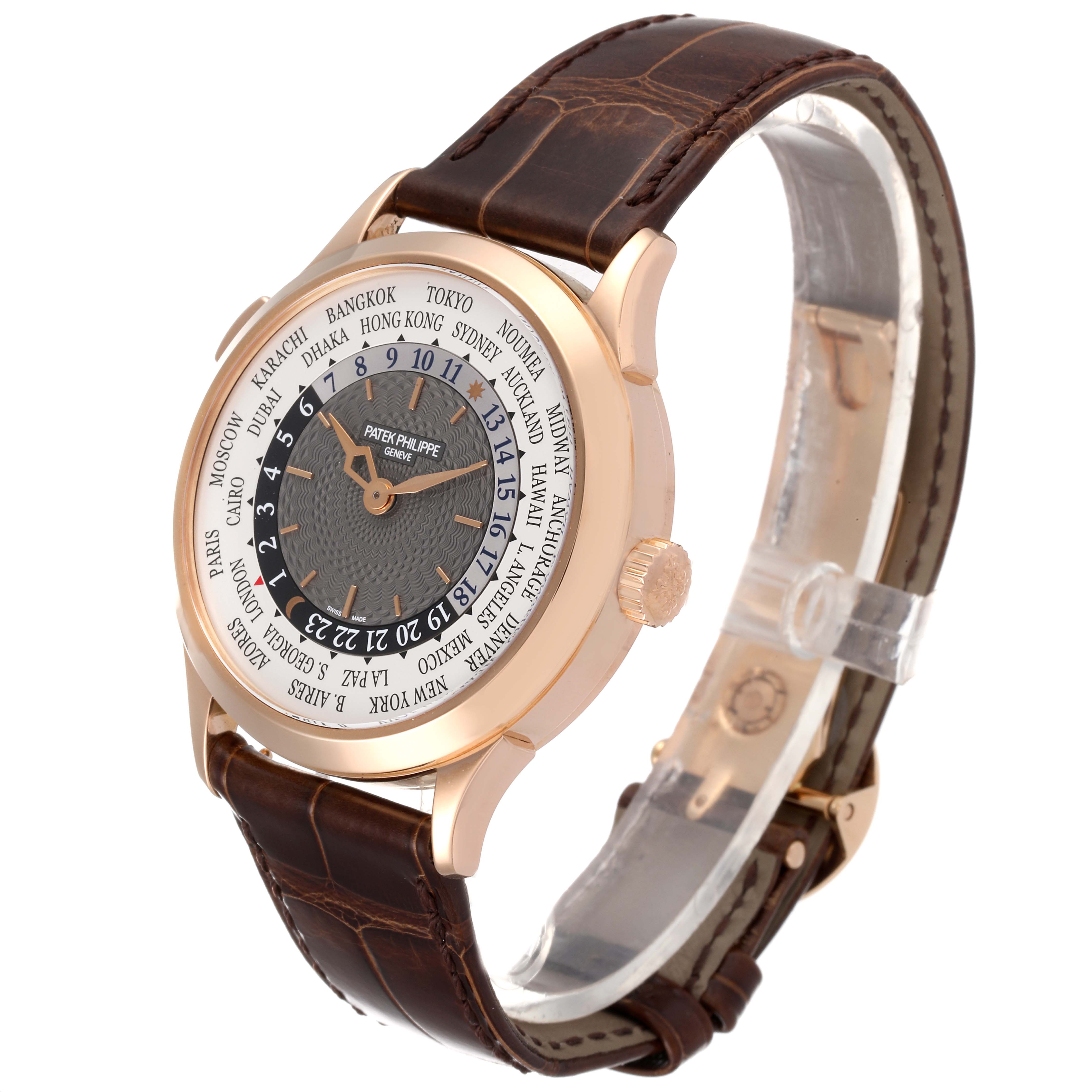 The image shows a side-angle view of a Patek Philippe Complications 5230R Men's Rose Gold Grey Dial 5230R Men's Rose Gold Grey Dial watch, displaying the face, bezel, crown, and leather strap.