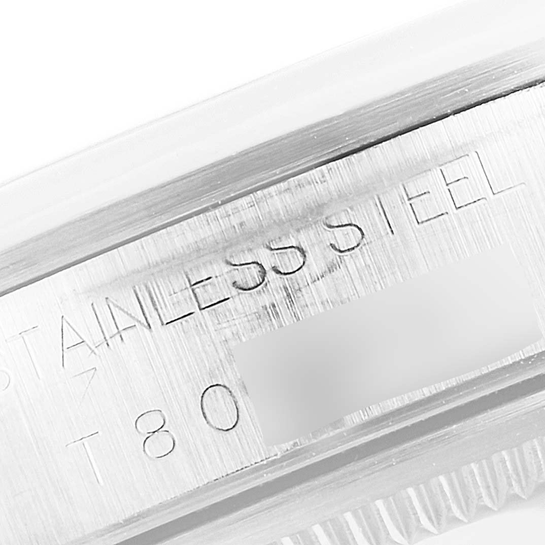 The image shows a close-up of the engraved text on the stainless steel case of a Rolex Air-King 14000 Men's Stainless Steel Blue Dial 14000 Men's Stainless Steel Blue Dial watch.