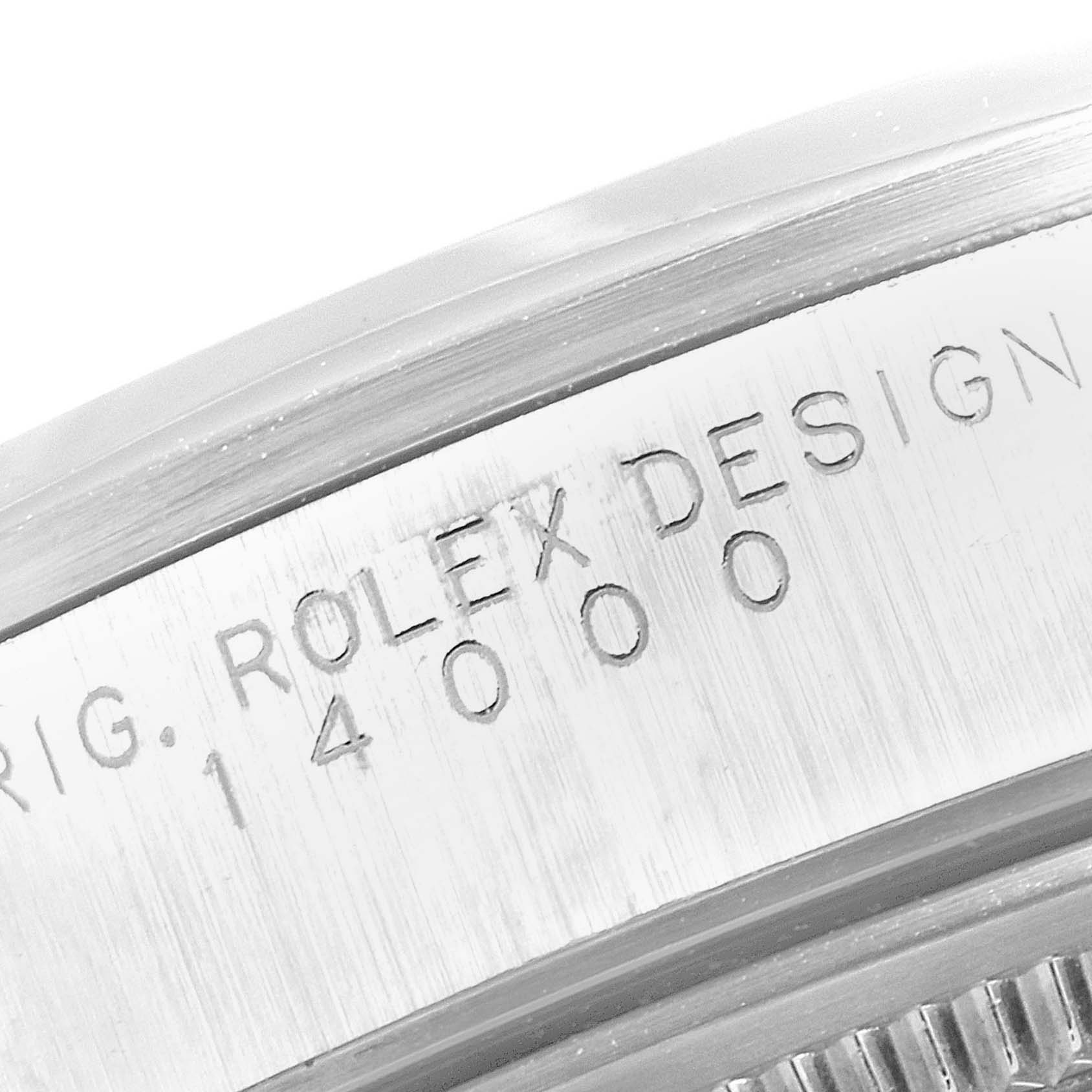 This image shows a close-up view of the case side with model engraving of a Rolex Air-King 14000 Men's Stainless Steel Pink Dial 14000 Men's Stainless Steel Pink Dial watch.