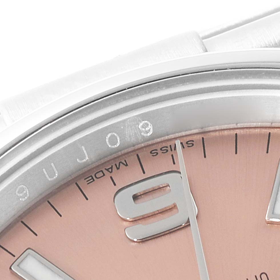 The image shows a close-up of the dial and bezel of a Rolex Air-King 114200 Men's Stainless Steel Pink Dial 114200 Men's Stainless Steel Pink Dial watch, highlighting the numeral 9 and "Swiss Made" text.
