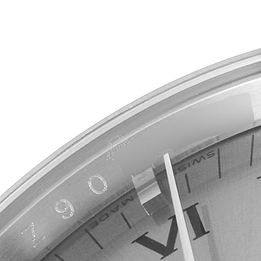 The image shows a close-up, angled view of the dial and part of the bezel on a Rolex Air-King 114200 Men's Stainless Steel Grey Dial 114200 Men's Stainless Steel Grey Dial watch.